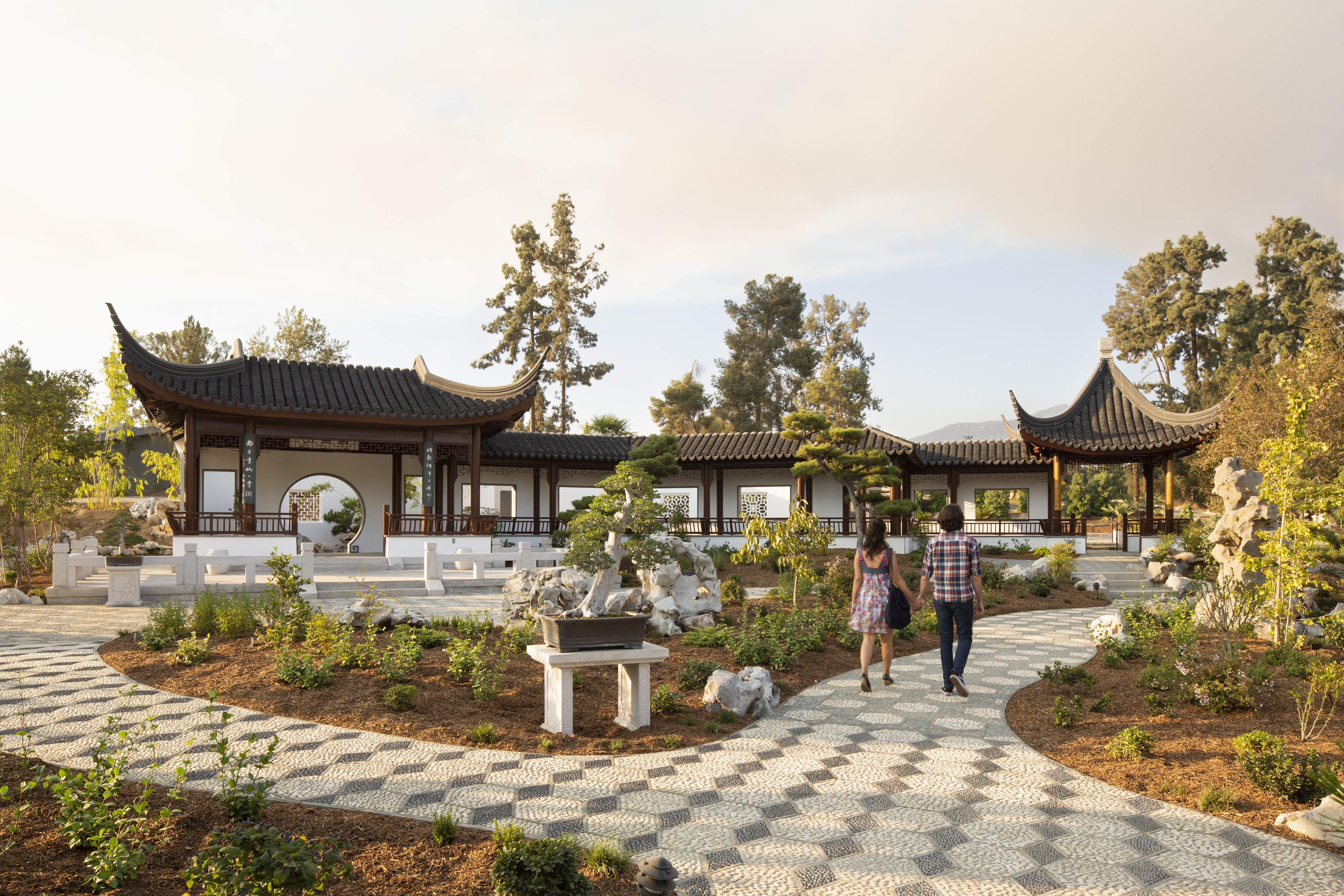 A courtyard that highlights the Chinese art of penjing – similar to Japanese bonsai – at Liu Fang Yuan in San Marino, California. Photo: The Huntington Library, Art Museum and Botanical Gardens.