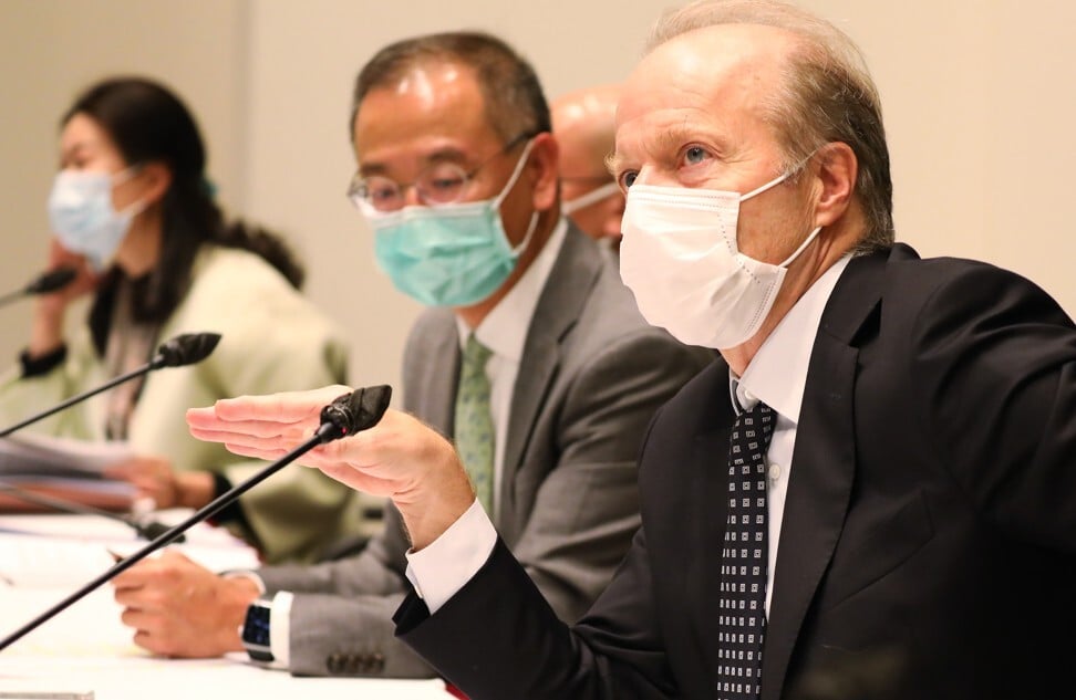 Eddie Yue (left), CEO of the Hong Kong Monetary Authority, and Ashley Alder (right), CEO of the Securities and Futures Commission, said in December that the city’s financial firms would be required to declare how their investments affect climate change beginning in 2025. Photo: Nora Tam