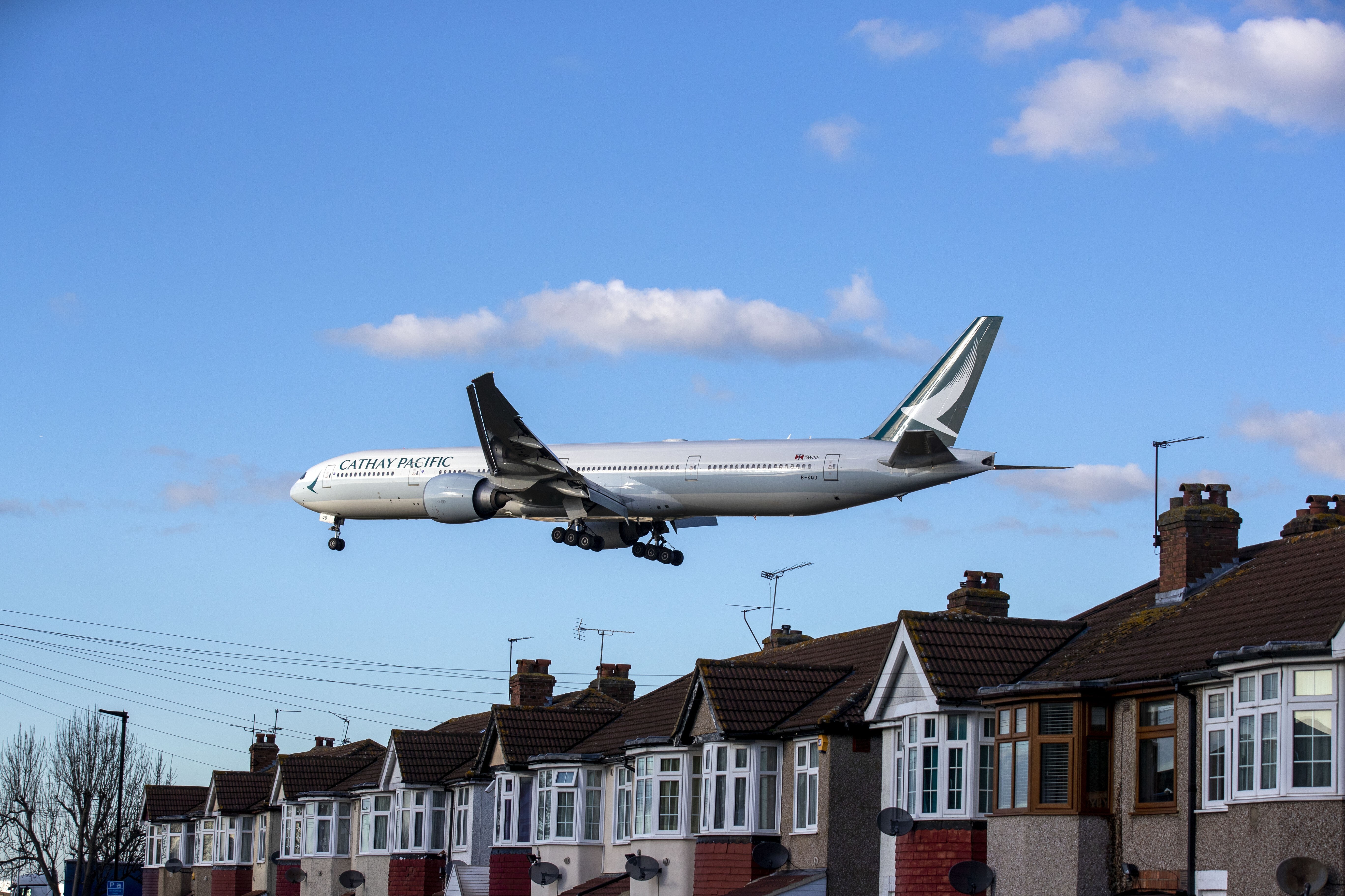 A Cathay Pacific Boeing 777 plane making its landing approach at Heathrow Airport in West London. Photo: Getty Images