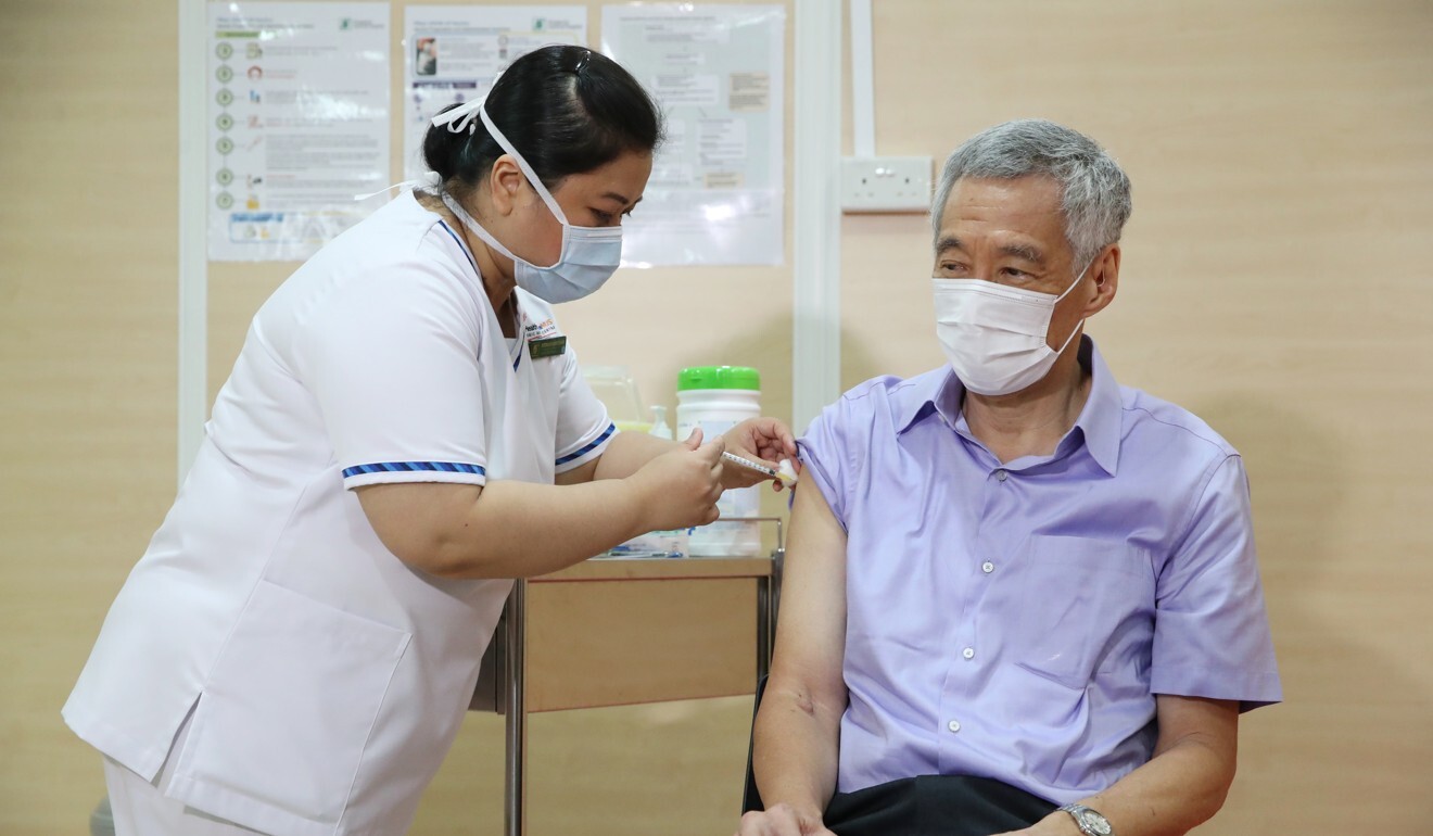 Singapore’s Prime Minister Lee Hsien Loong receives the first dose of the Pfizer-BioNTech Covid-19 vaccine on January 8. Photo: EPA