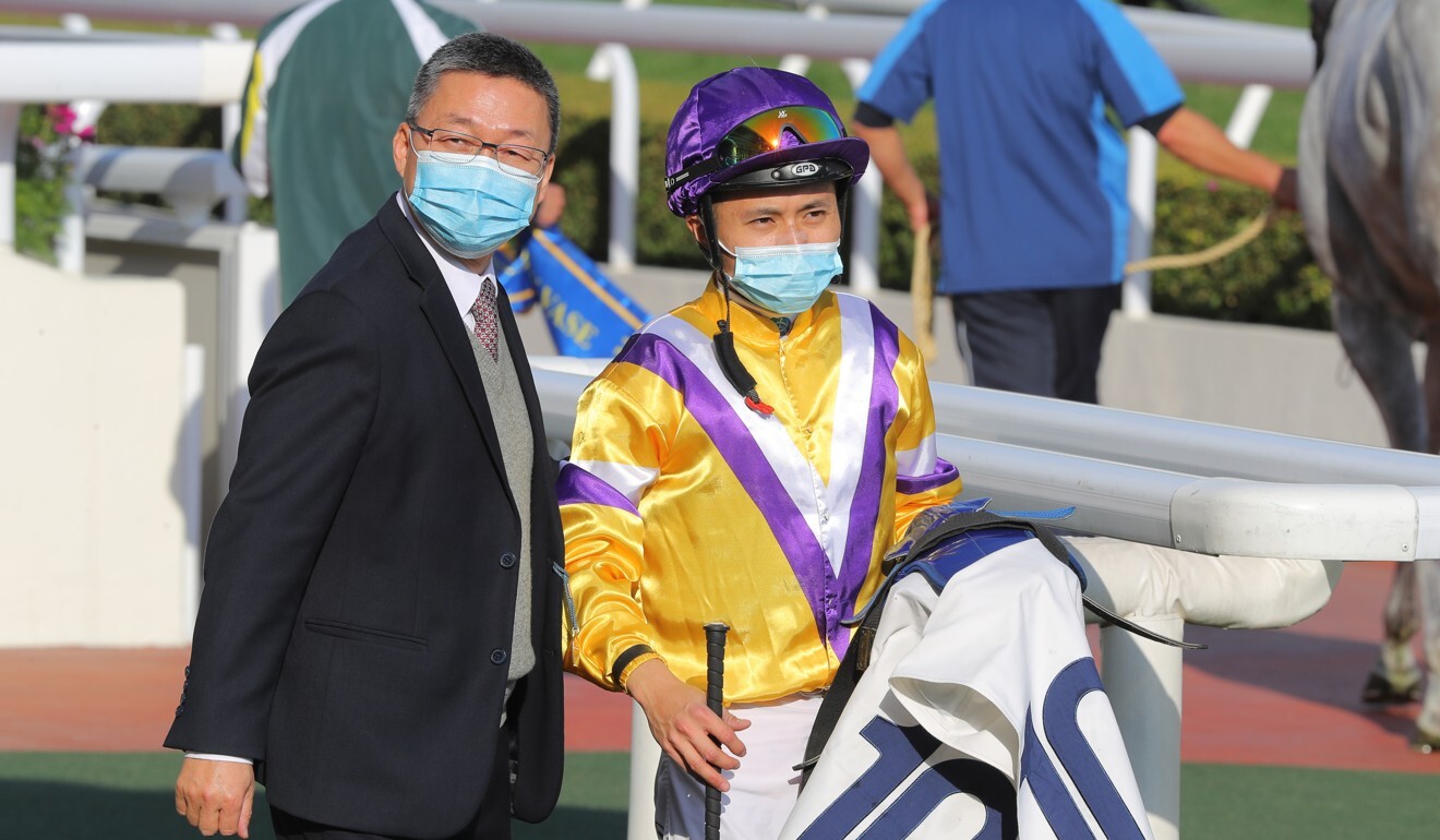 Matthew Poon with trainer Francis Lui after Glorious Dragon’s victory at Sha Tin on Sunday.