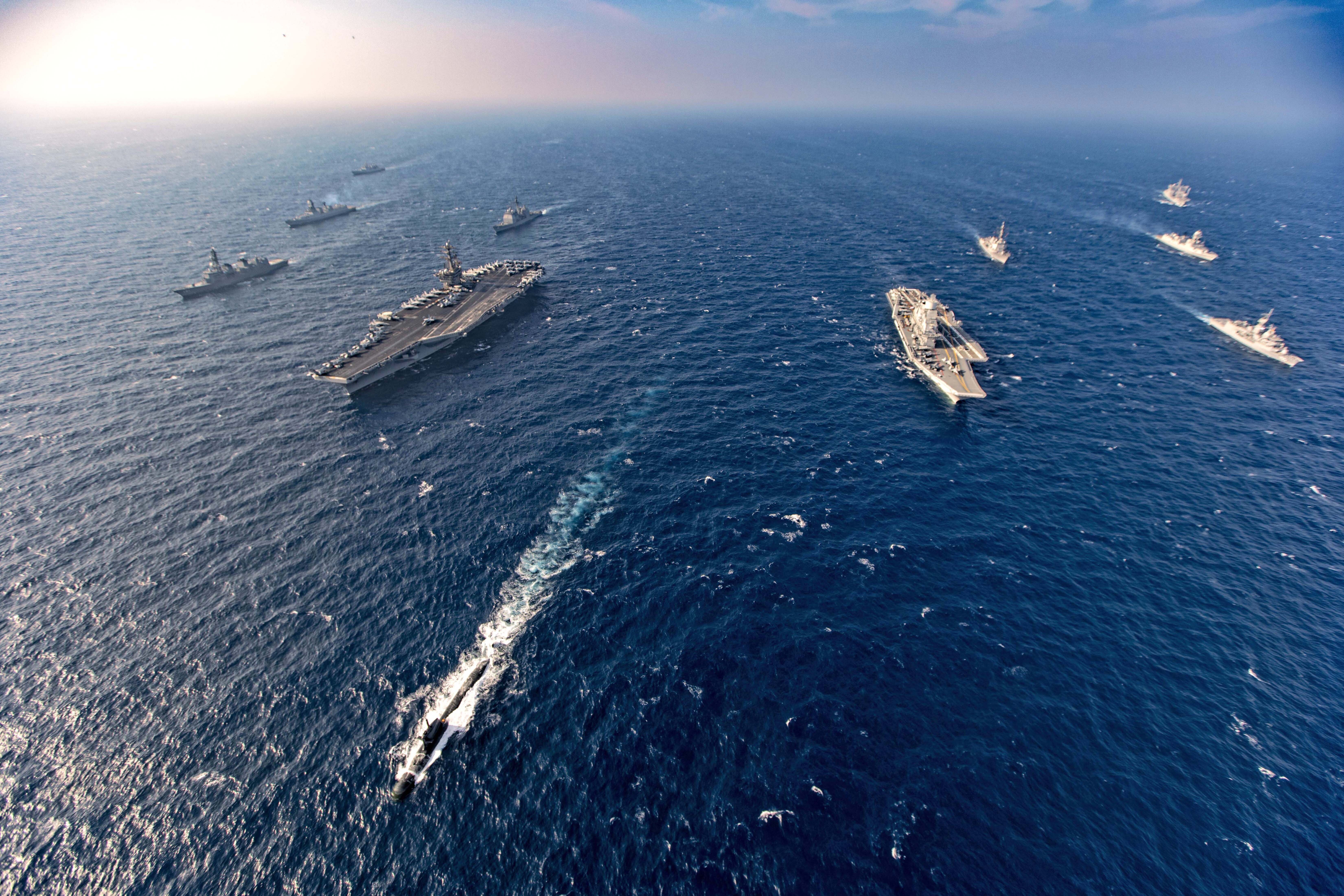 Aircraft carriers and warships from India, US, Japan and Australia – the four countries comprising the Quad – participate in the Malabar naval exercise in November 2020. Photo: AP