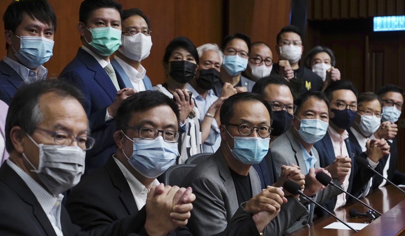 Hong Kong’s opposition legislators pose for a picture before a press conference at the Legislative Council on November 9, 2020. Photo: AP