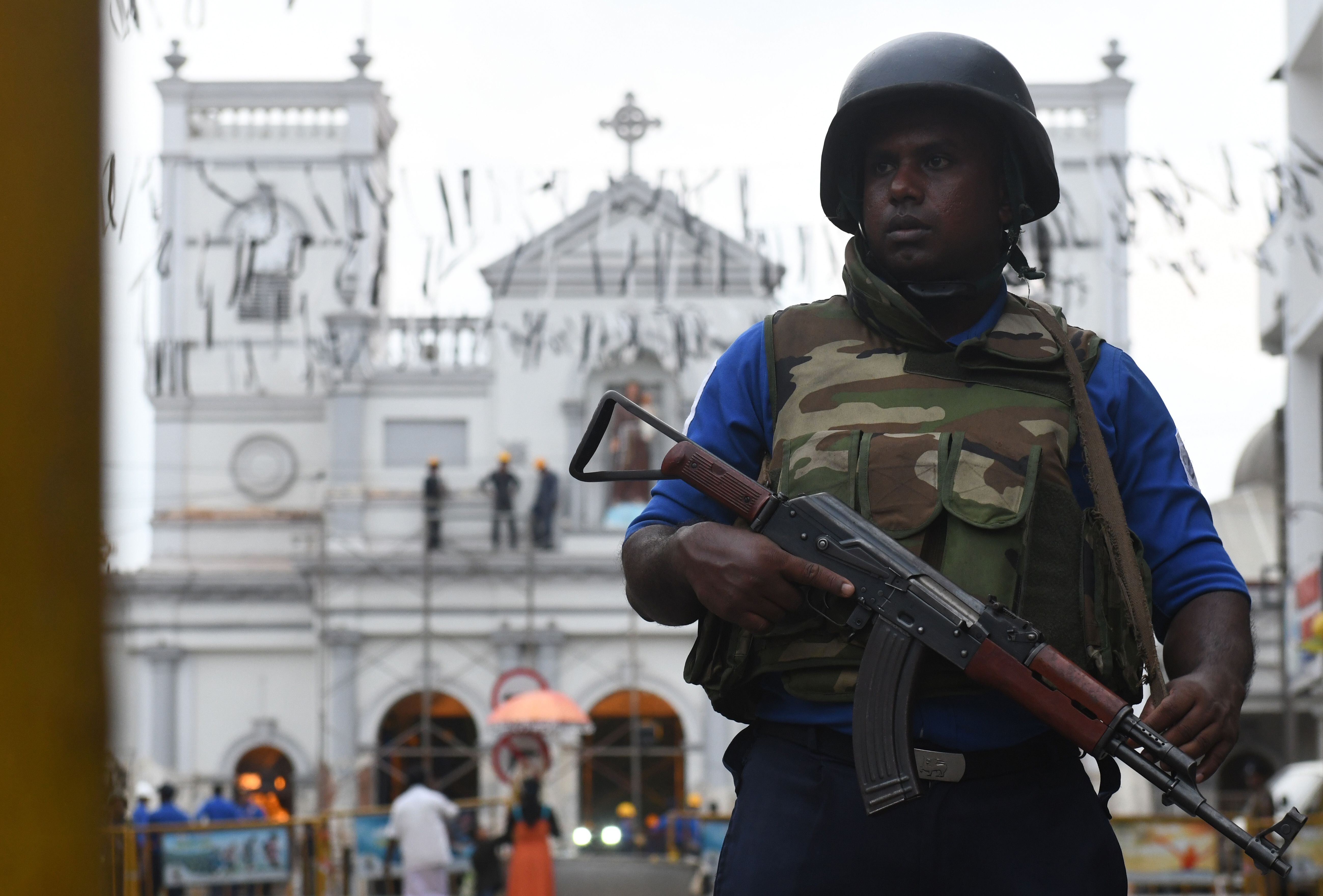 A Sri Lankan soldier guards St. Anthony’s Shrine in Colombo, a week after a series of bomb blasts targeting churches and luxury hotels in Sri Lanka in 2019. Photo: AFP