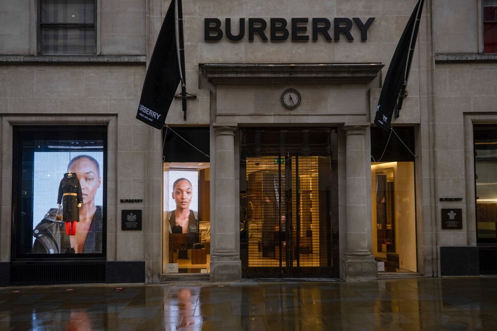 Exclusive Shopping In New Bond Street Showing Store Flags For