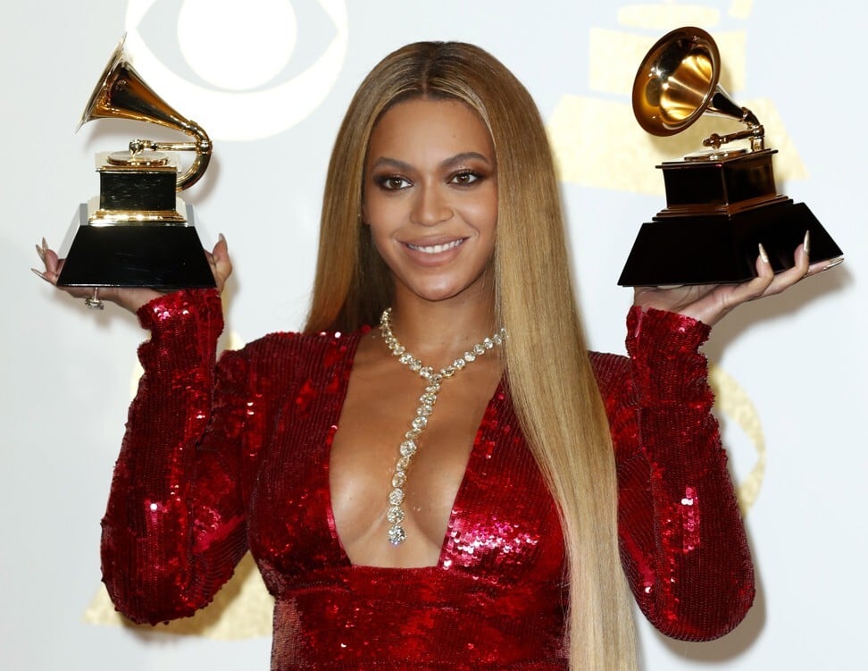 Singer Beyoncé poses with two awards after the 59th annual Grammy Awards in February 2017. Photo: EPA-EFE