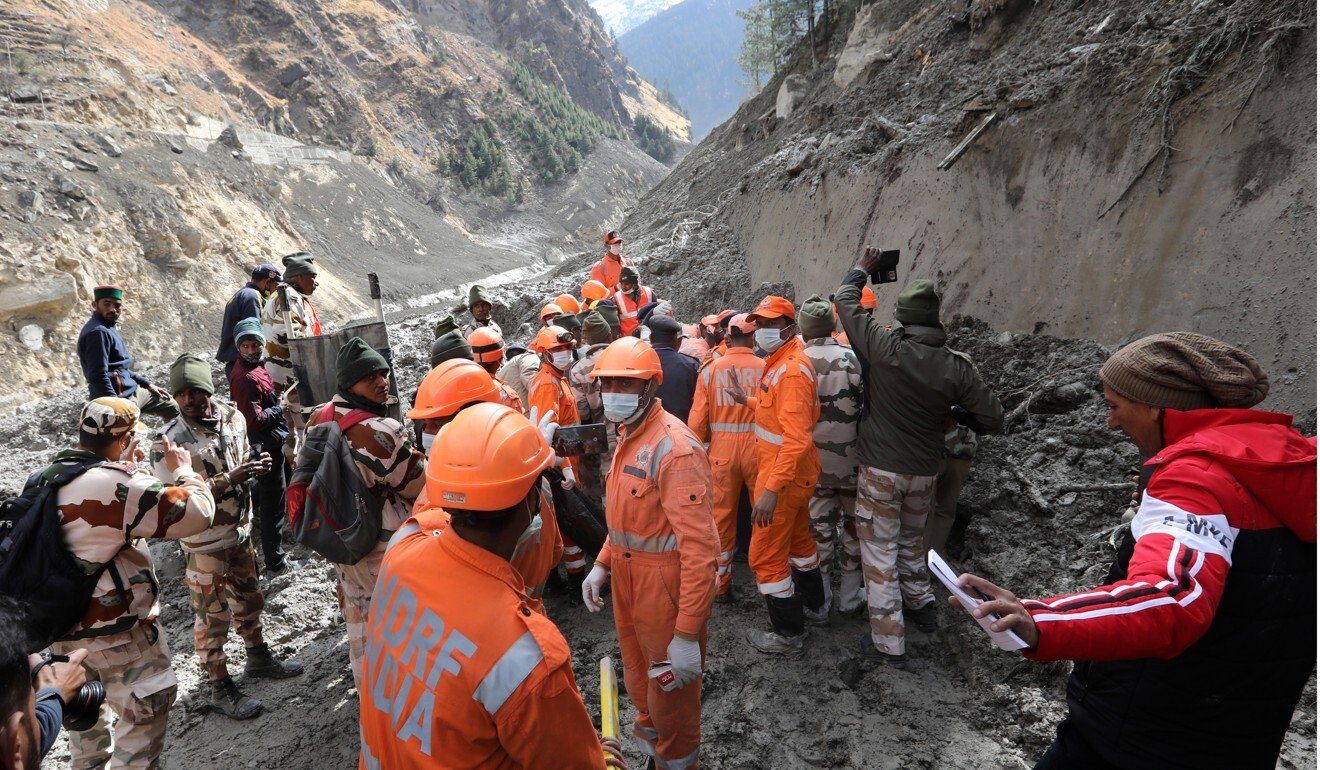 Rescuers near the damaged Dhauliganga hydro power project in Uttarakhand, India, following a flash flood thought to have been caused by a falling glacier. Photo: EPA