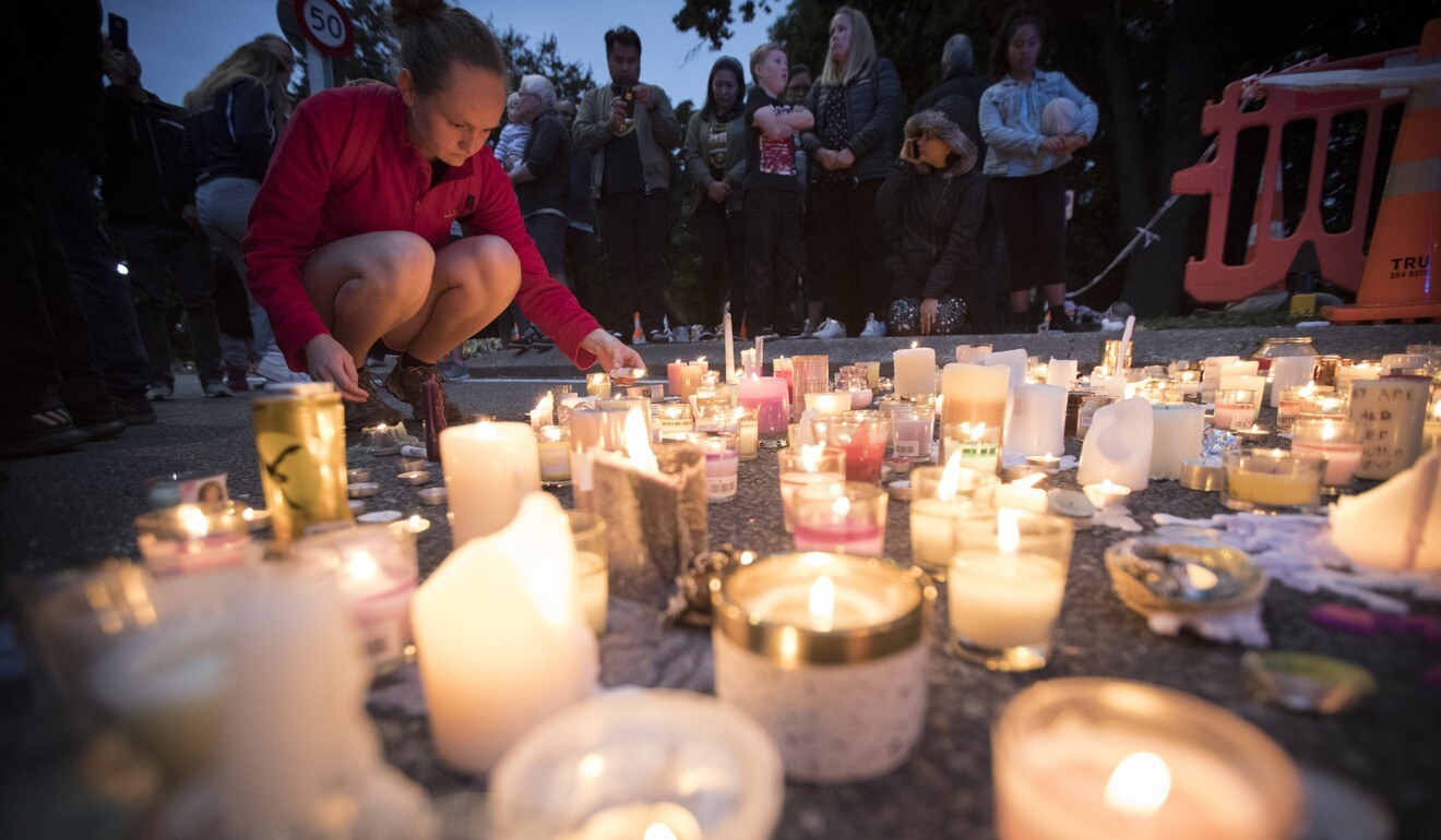 Candles are placed outside the Al Noor mosque in Christchurch in March 2019 to commemorate victims of the shooting. Photo: AP