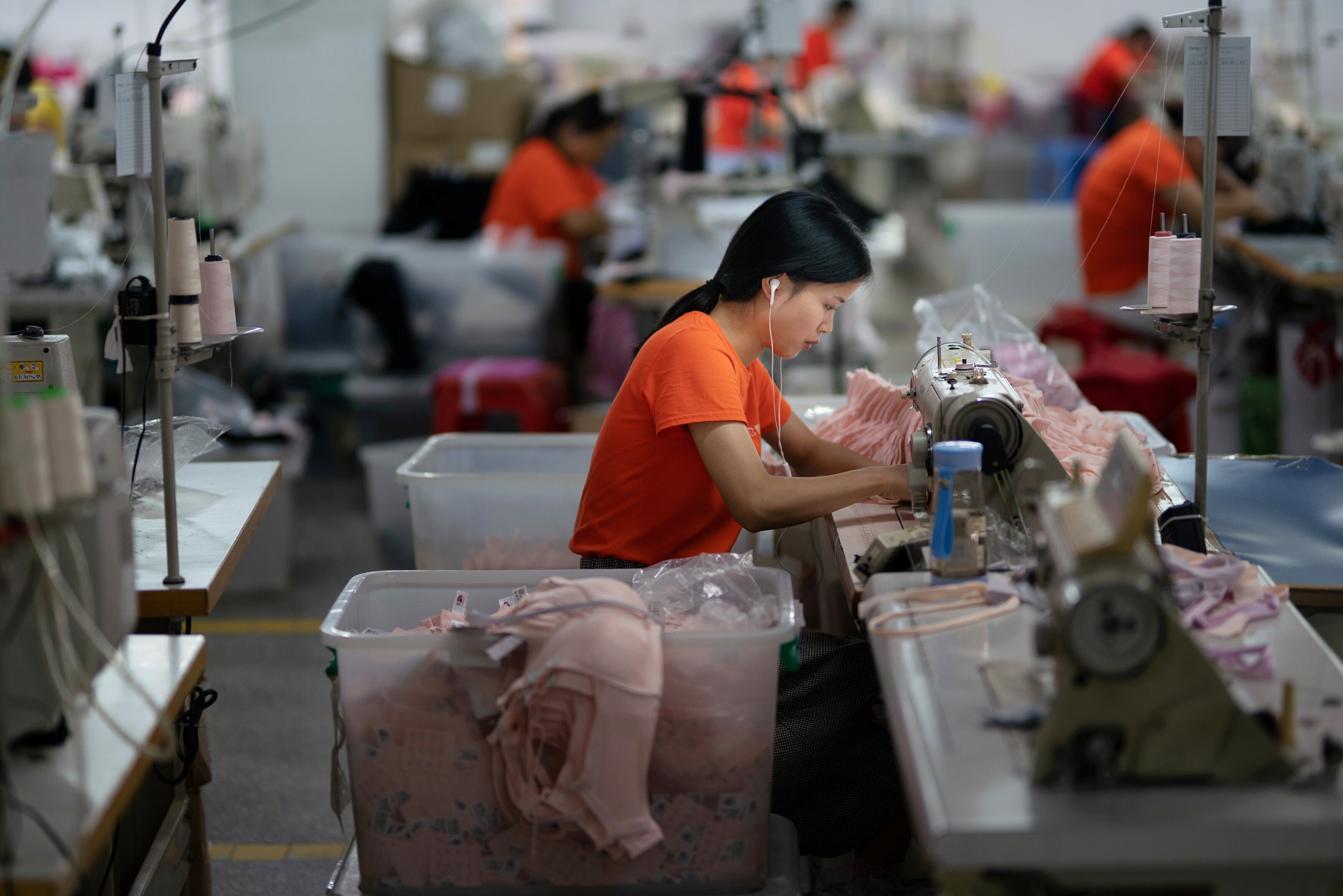 Workers produce undergarments at a Cosmo Lady factory in Dongguan. Photo: Reuters