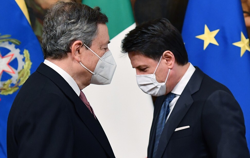 Italy’s new Prime Minister Mario Draghi, left, and outgoing prime minister Giuseppe Conte at Chigi Palace in Rome, Italy on Saturday. Photo: EPA-EFE