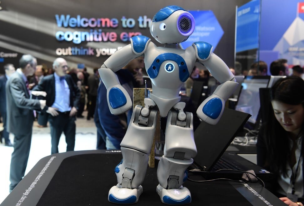A small interactive robot from IBM's Watson AI department shows some moves at the digital business fair CEBIT in Hanover, Germany, on March 15, 2016. Photo: AFP