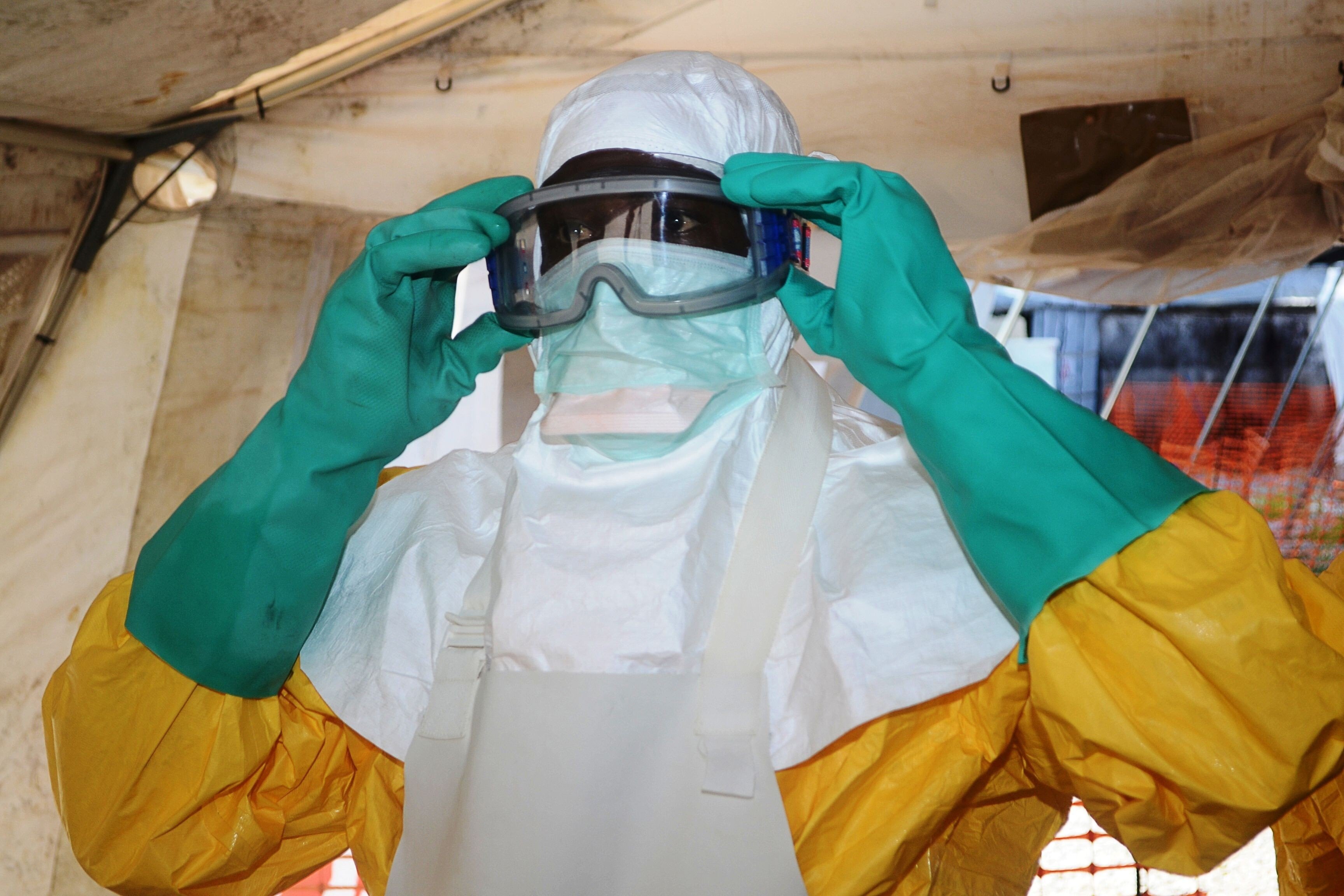 A medical worker puts on protective gear in an isolation ward of a hospital in Guinea, which is seeing the first resurgence of the Ebola haemorrhagic fever since a 2013-2016 epidemic left thousands dead. Photo: AFP