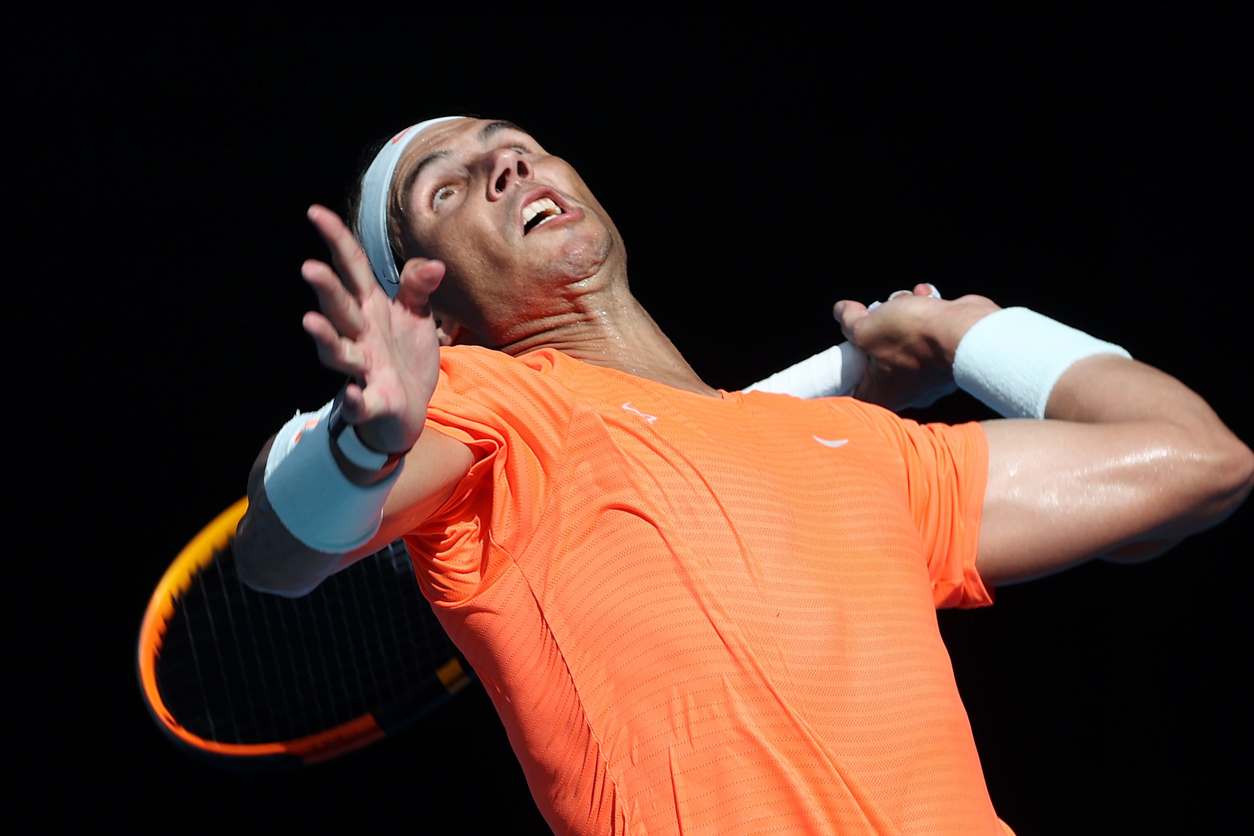 Rafael Nadal serves against Italy’s Fabio Fognini during their men's singles match on day eight of the Australian Open. Photo: AFP