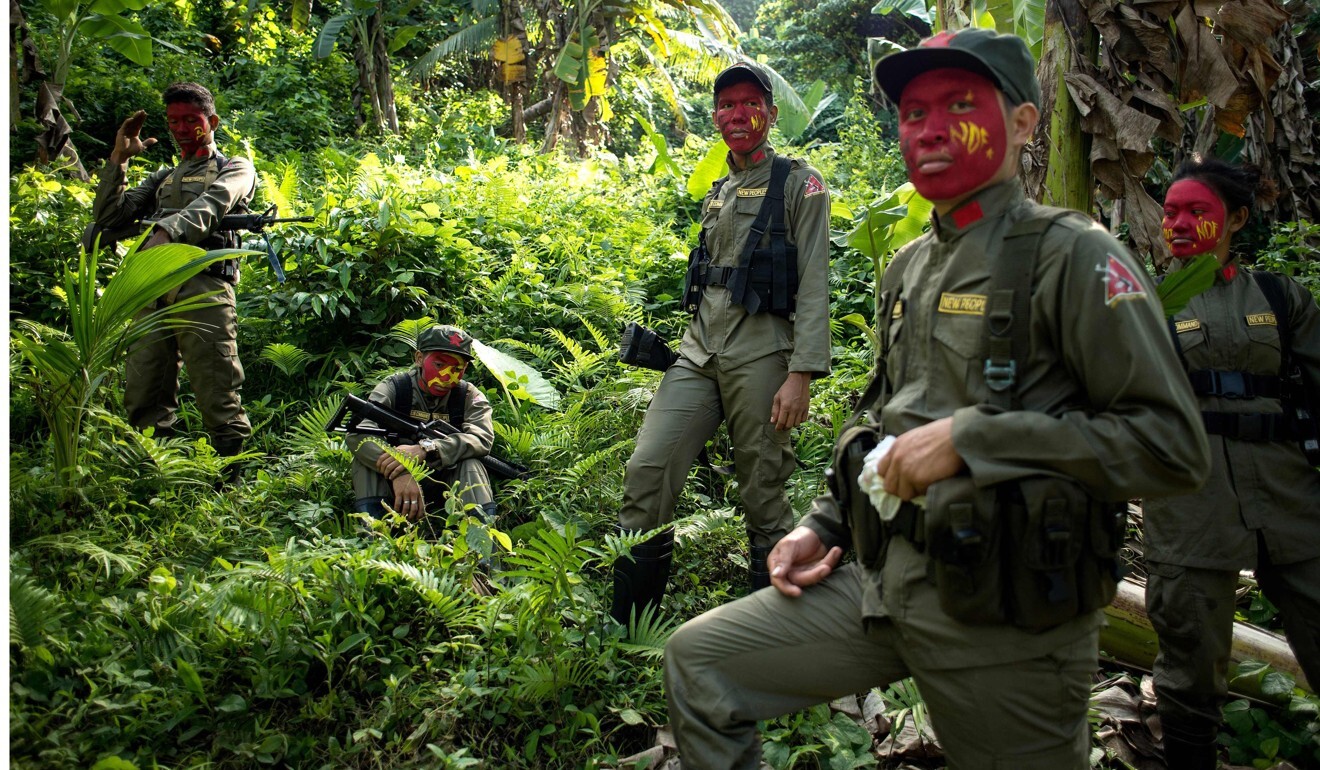 Guerillas of the New People's Army (NPA) are seen in the Sierra Madre mountain range in 2017. Photo: AFP