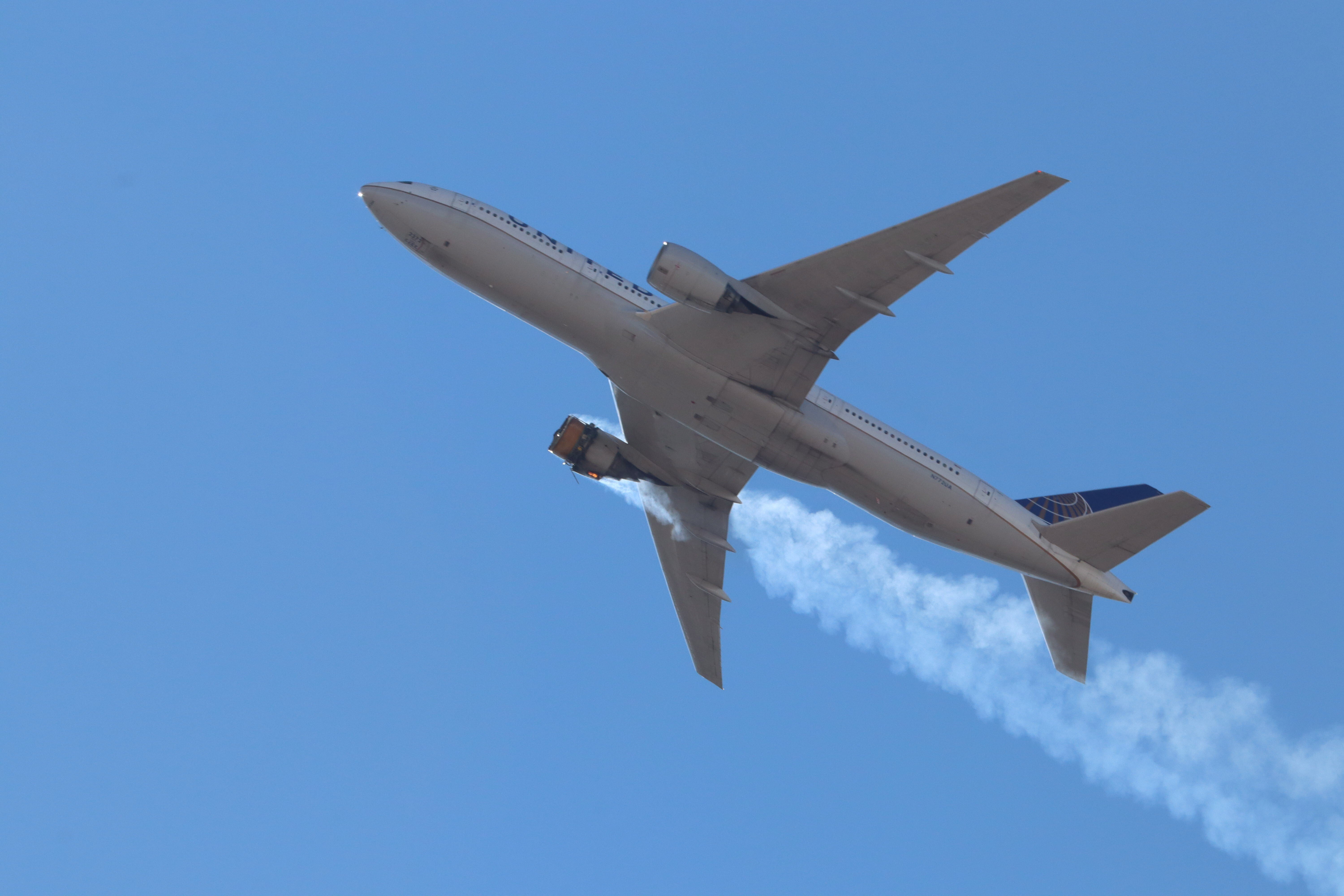 Smoke emanates from an engine fire on a Boeing 777 operated as United Airlines flight 328 on Saturday. Debris from the plane was scattered over Broomfield, Colorado. Photo: EPA/Hayden Smith @speedbird5280