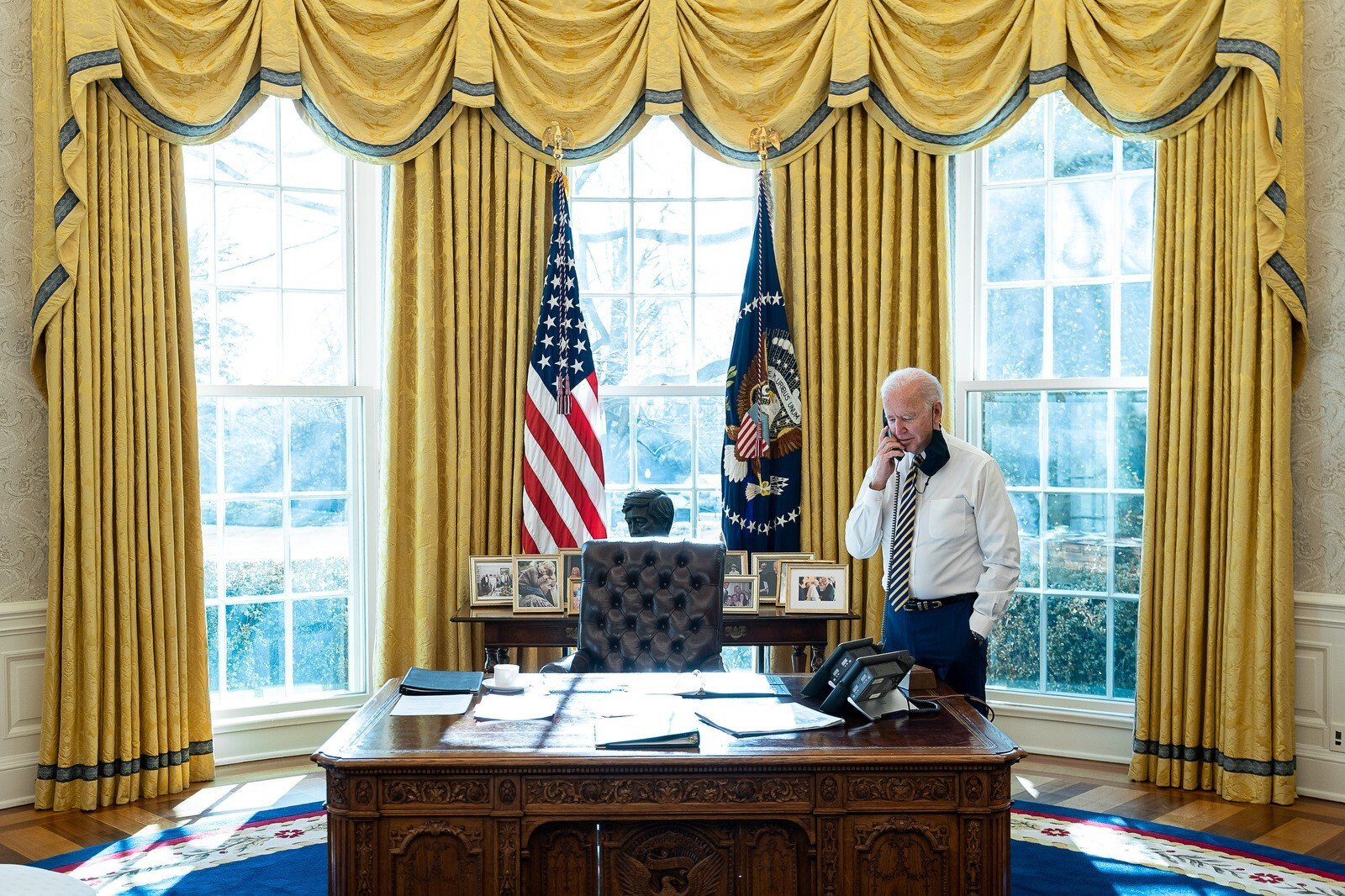 President Joe Biden talks on the phone in the Oval Office of the White House on January 22. The days of US allies giving Washington blank-cheque support are over. Photo: White House / Zuma Wire/ zumapress.com
