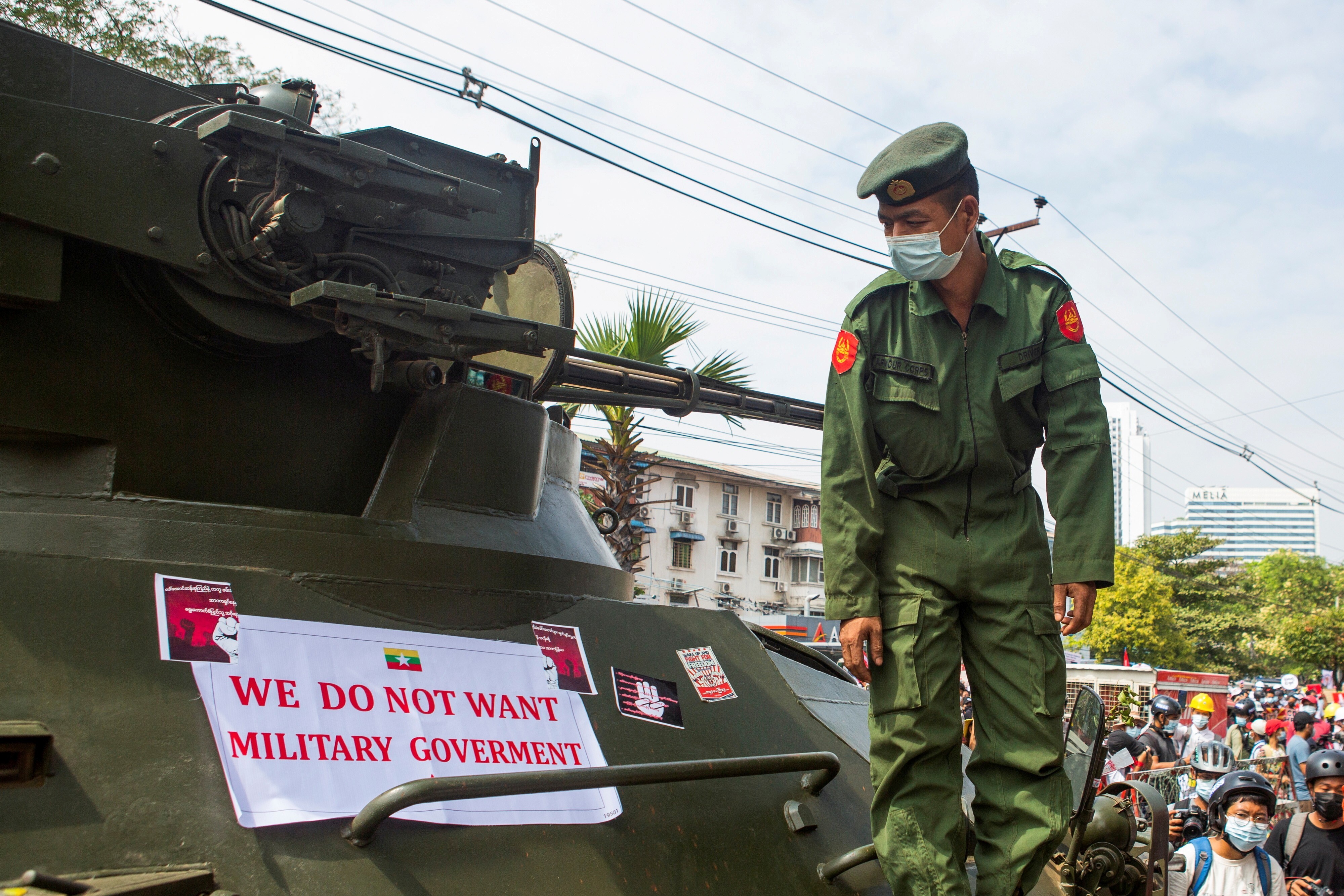 A banner attached to a military vehicle outside Myanmar’s Central Bank during a protest against the military coup. Photo: Reuters