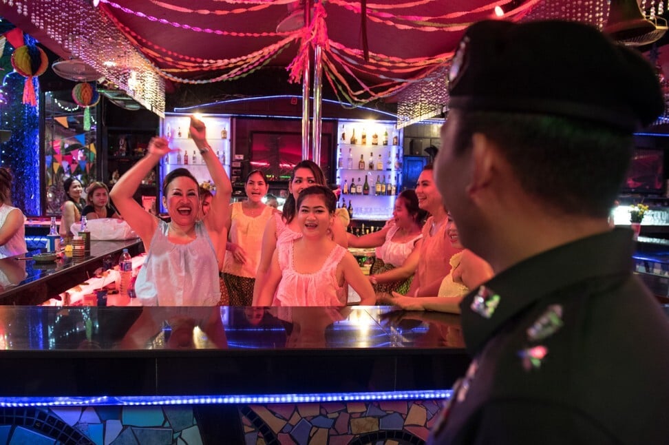 Women hostesses at a bar in Pattaya. Thailand’s legal system offers few safeguards for women involved in such jobs. Photo: AFP
