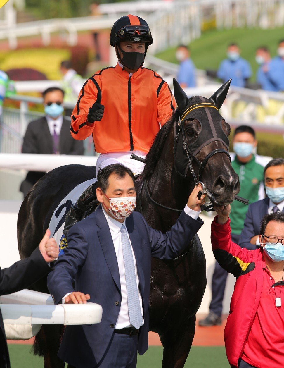 Michael Chang celebrates the win of Simply Spectacular at Sha Tin on Sunday.