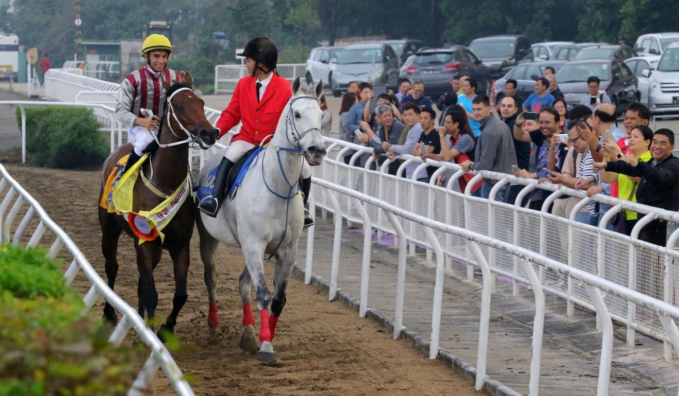 Joao Moreira returns after saluting aboard Romantic Touch in the 2018 Macau Hong Kong Trophy. Photo: Kenneth Chan