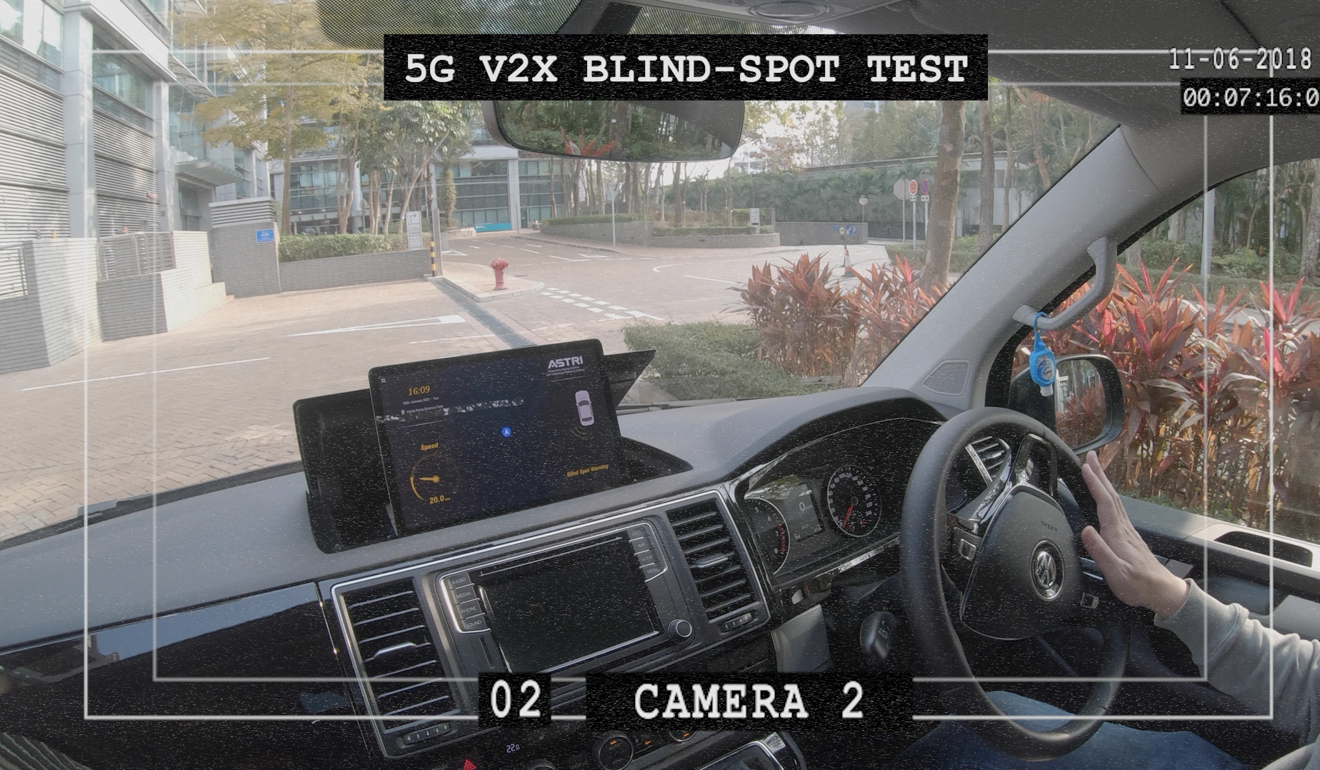 Traffic information collected by the road-test car’s C-V2X communication technology is displayed on a monitor fixed to the vehicle’s dashboard.