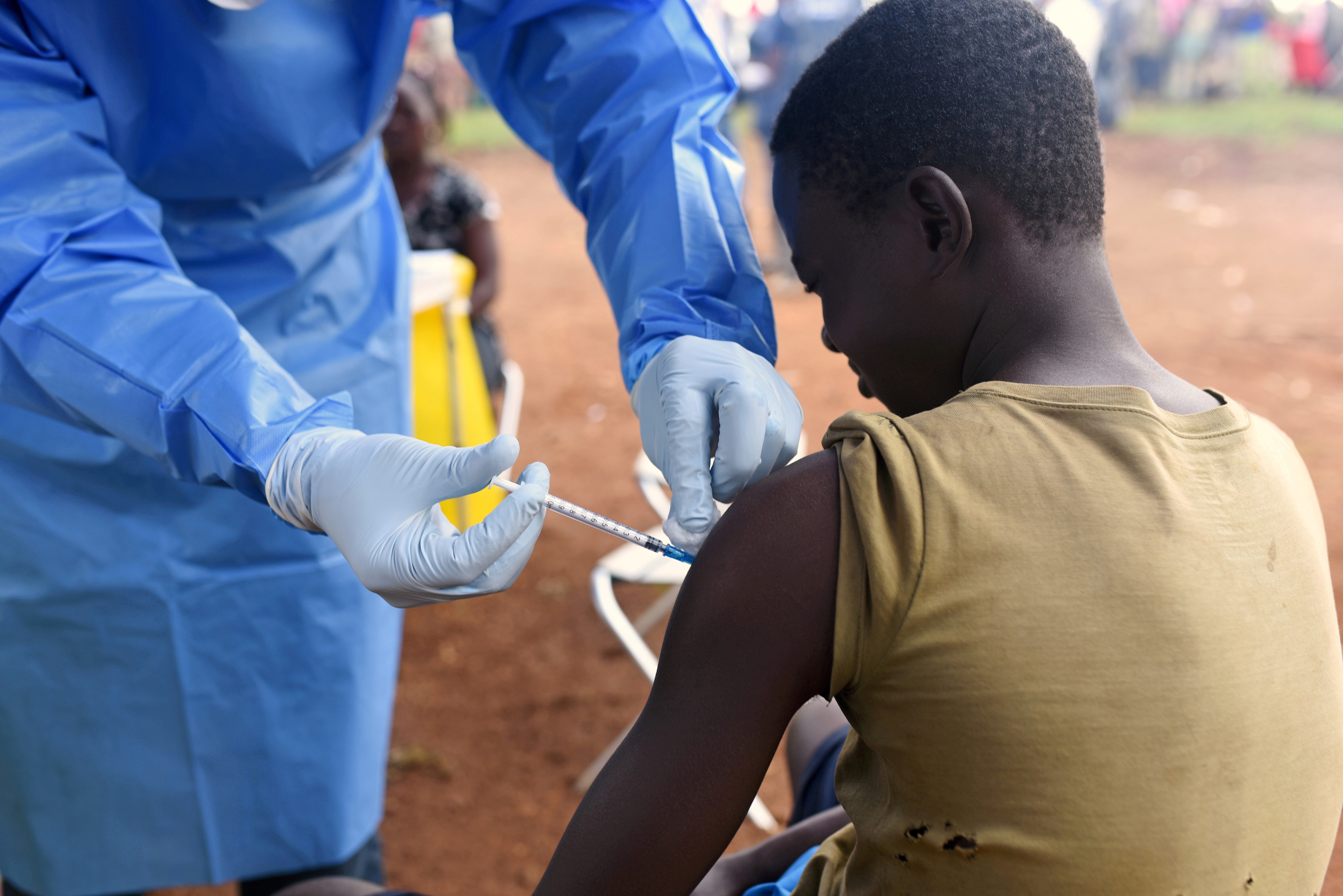 A health worker administers an Ebola vaccine in the Democratic Republic of Congo, amid an outbreak in the country and in Guinea. Photo: Reuters