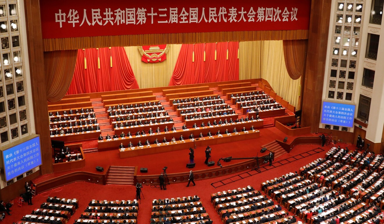 A resolution calling for a massive overhaul of Hong Kong’s electoral system passed to thunderous applause on Thursday at the National People’s Congress. Photo: Reuters