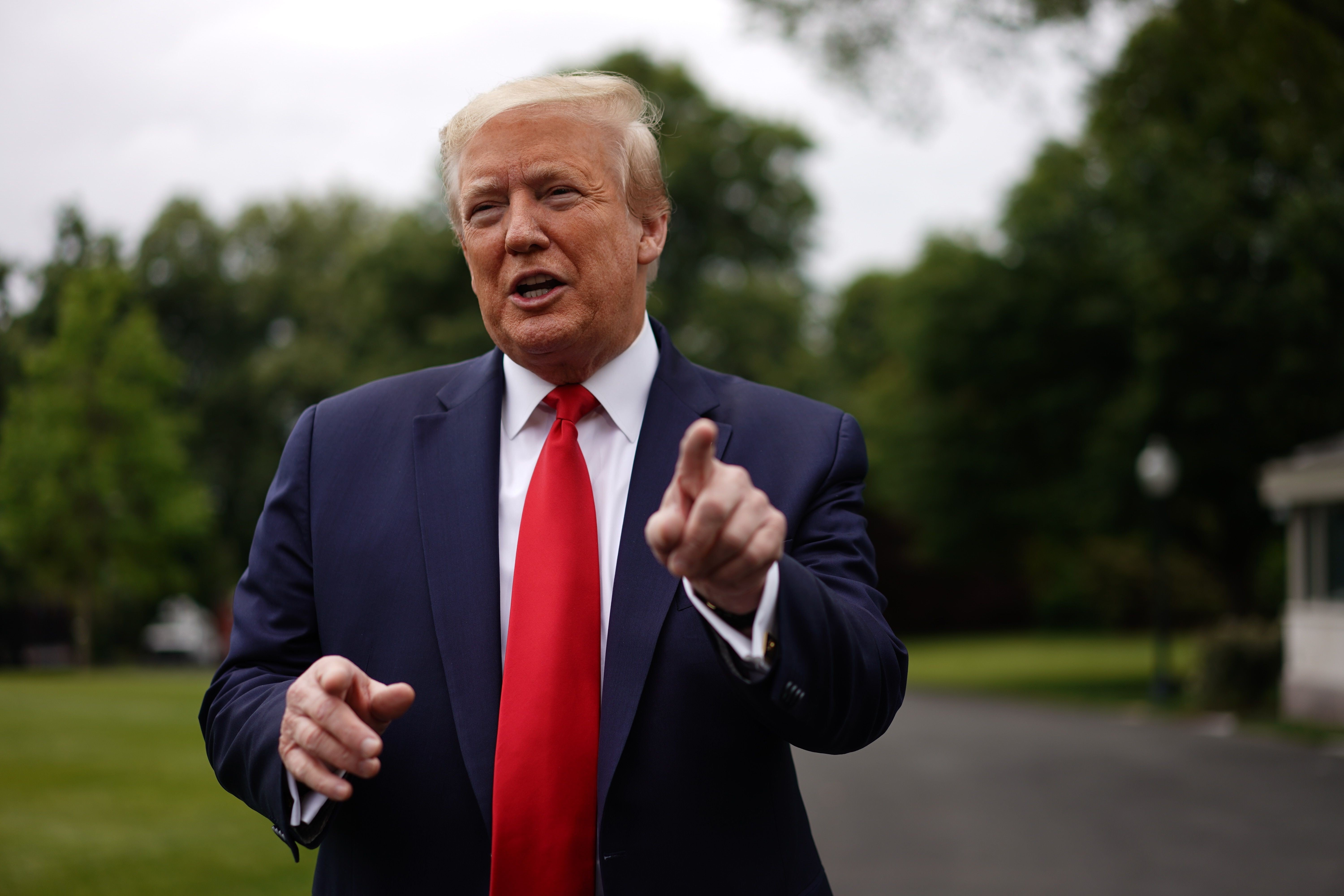 Donald Trump speaks to the press outside the White House in May 2020. Photo: AFP