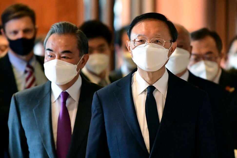 Wang Yi, left, and Yang Jiechi arrive at the opening session of the talks at the Captain Cook Hotel in Anchorage. Photo: Pool/AFP