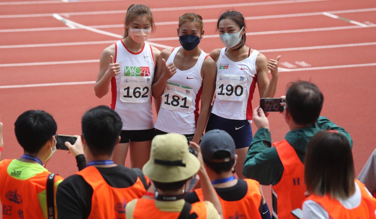 High jump winner Tiffany Tang (centre) stands on the podium at the preseason trial at Siu Sai Wan Sports Ground. Photo: Xiaomei Chen