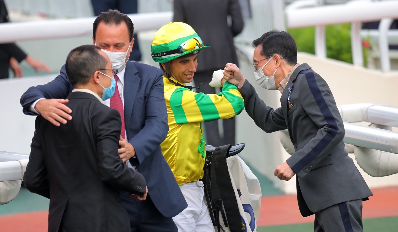 Caspar Fownes and Joao Moreira with Sky Darci’s connections after a victory at Sha Tin.