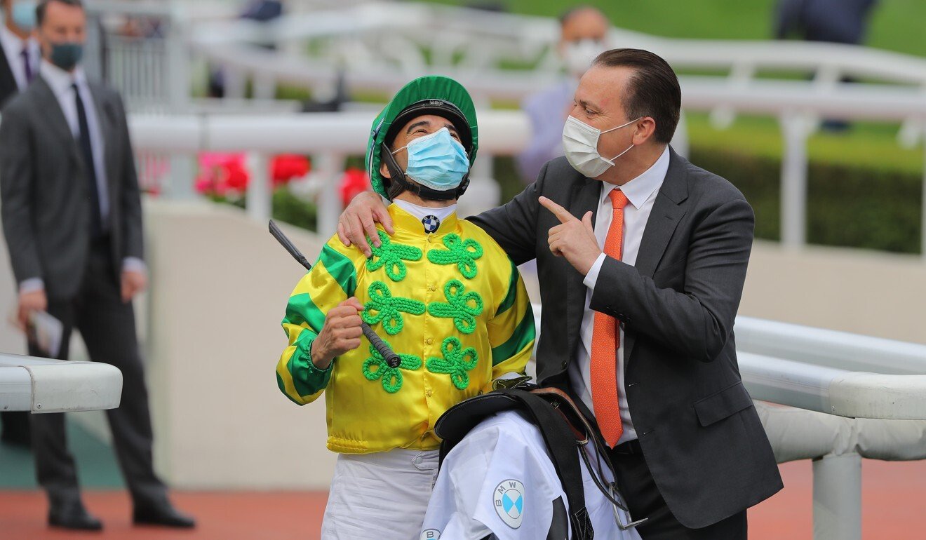 Joao Moreira and Caspar Fownes celebrate Sunday’s Hong Kong Derby victory.