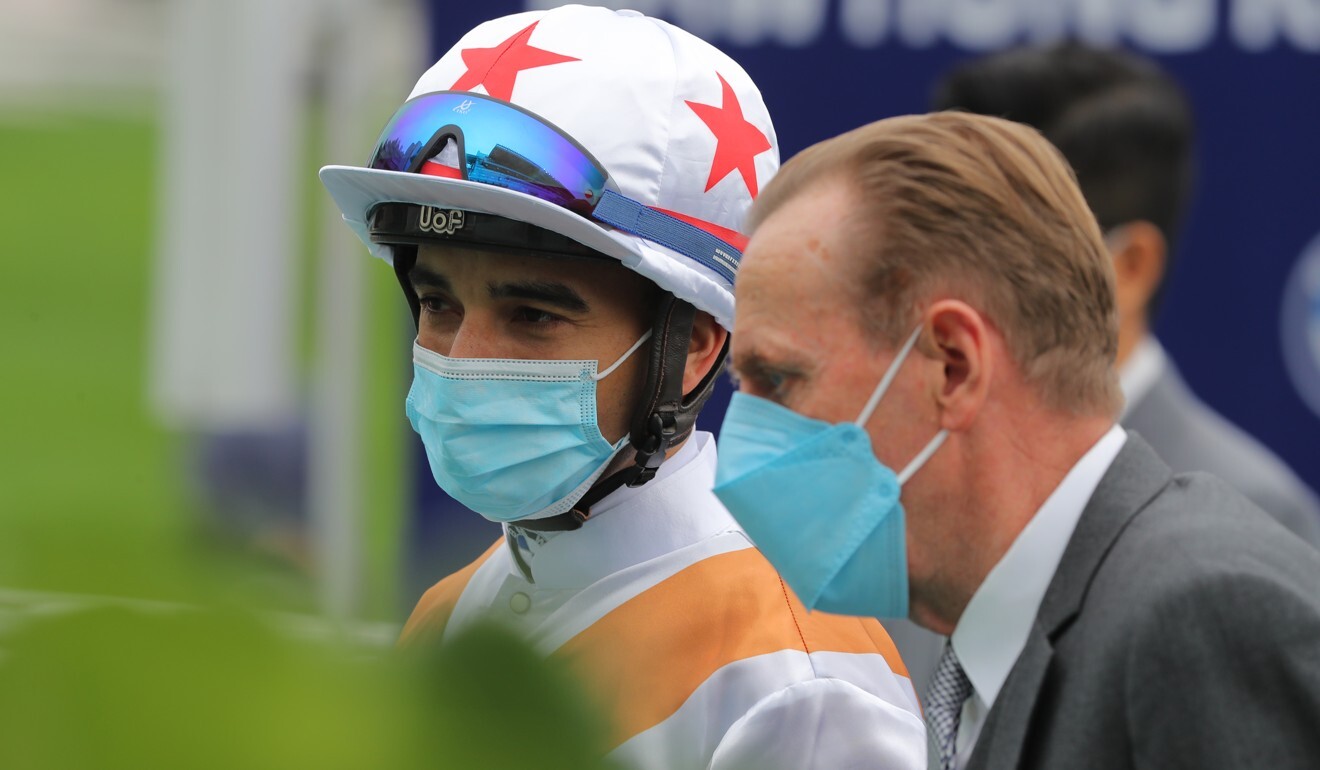 Jockey Joao Moreira and trainer John Size after Courier Wonder’s victory.