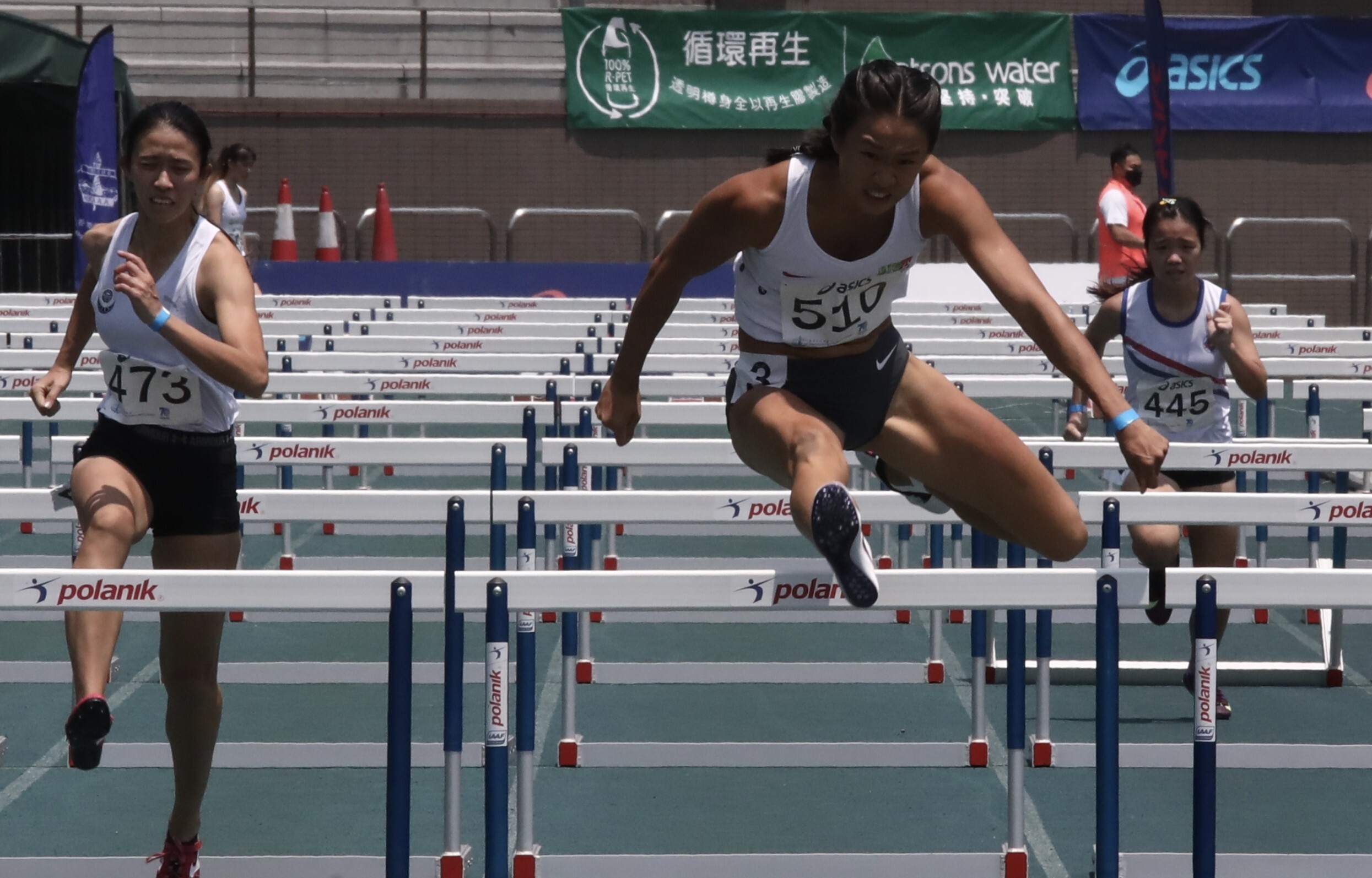 Vera Lui wins the heats in 13.49 seconds at the Hong Kong Athletics Championships in Tseung Kwan O Sports Ground, her seasonal best and fifth best time. Photo: Jonathan Wong
