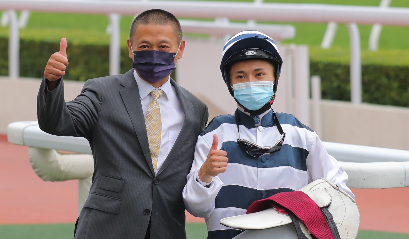 Danny Shum and Matthew Poon celebrate the win.