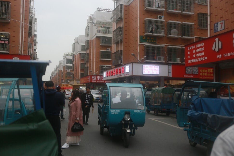 When night falls in Beixiazhu, the streets fill up with these auto rickshaws as they haul their goods to express delivery locations to be shipped out to buyers. Photo: Tracy Qu.