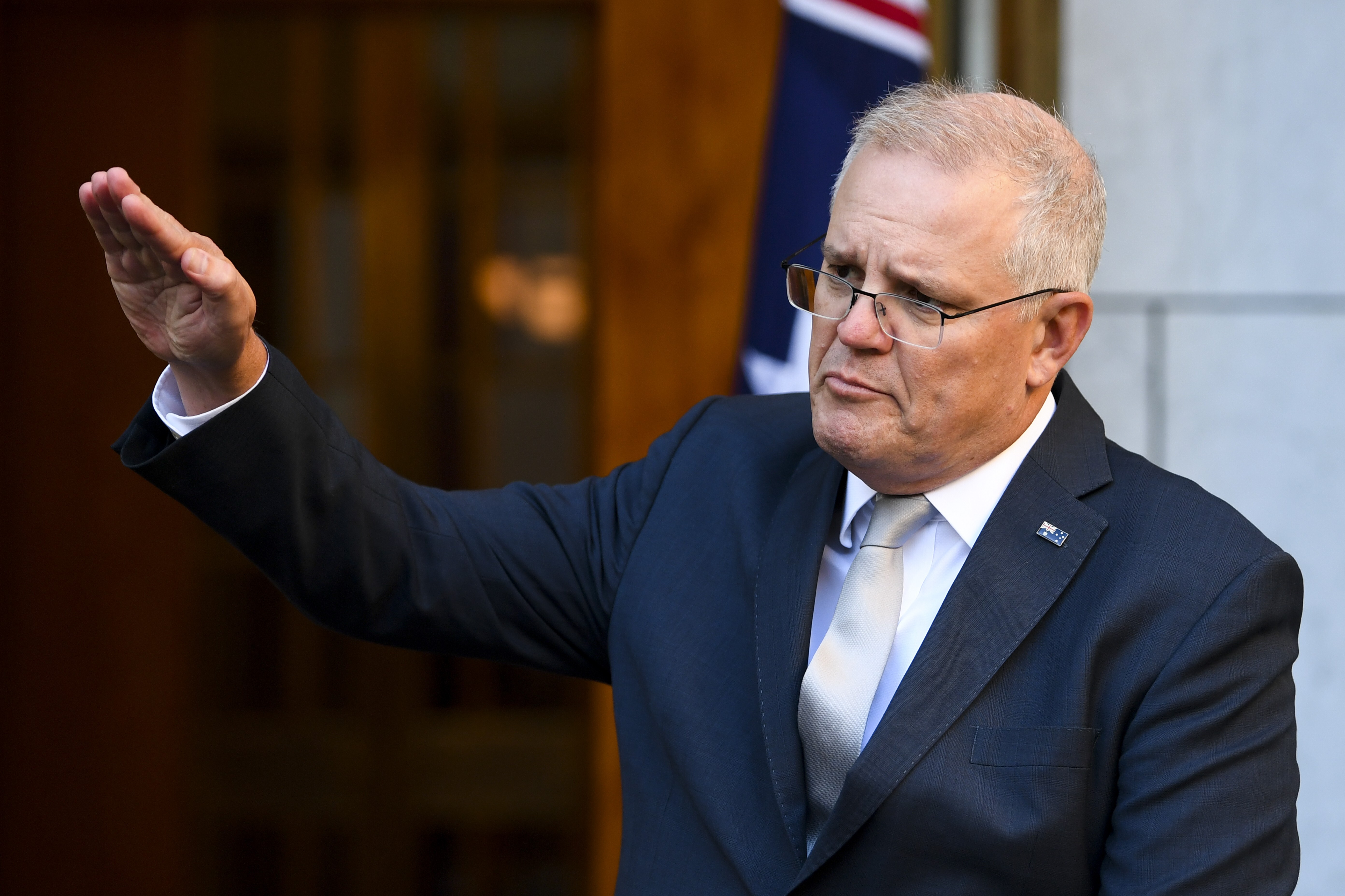 Australian Prime Minister Scott Morrison has stood by his decision to ban travel from India, despite warnings and criticism from doctors, human rights groups and the Indian-Australian community. Photo: AAP Image via DPA