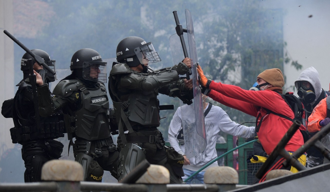 Demonstrators clash with the police in Bogota, Colombia. Photo: AFP