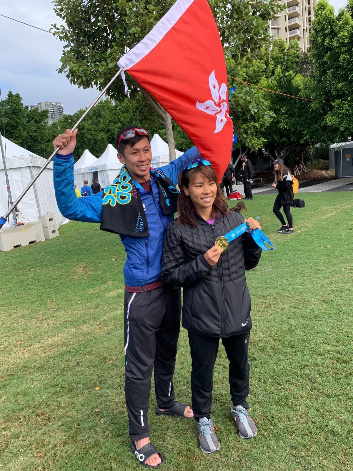 Christy Yiu and her husband Chan Ka-ho after breaking the Hong Kong women's marathon record at the 2019 Gold Coast Marathon in Australia. Photo: Handout