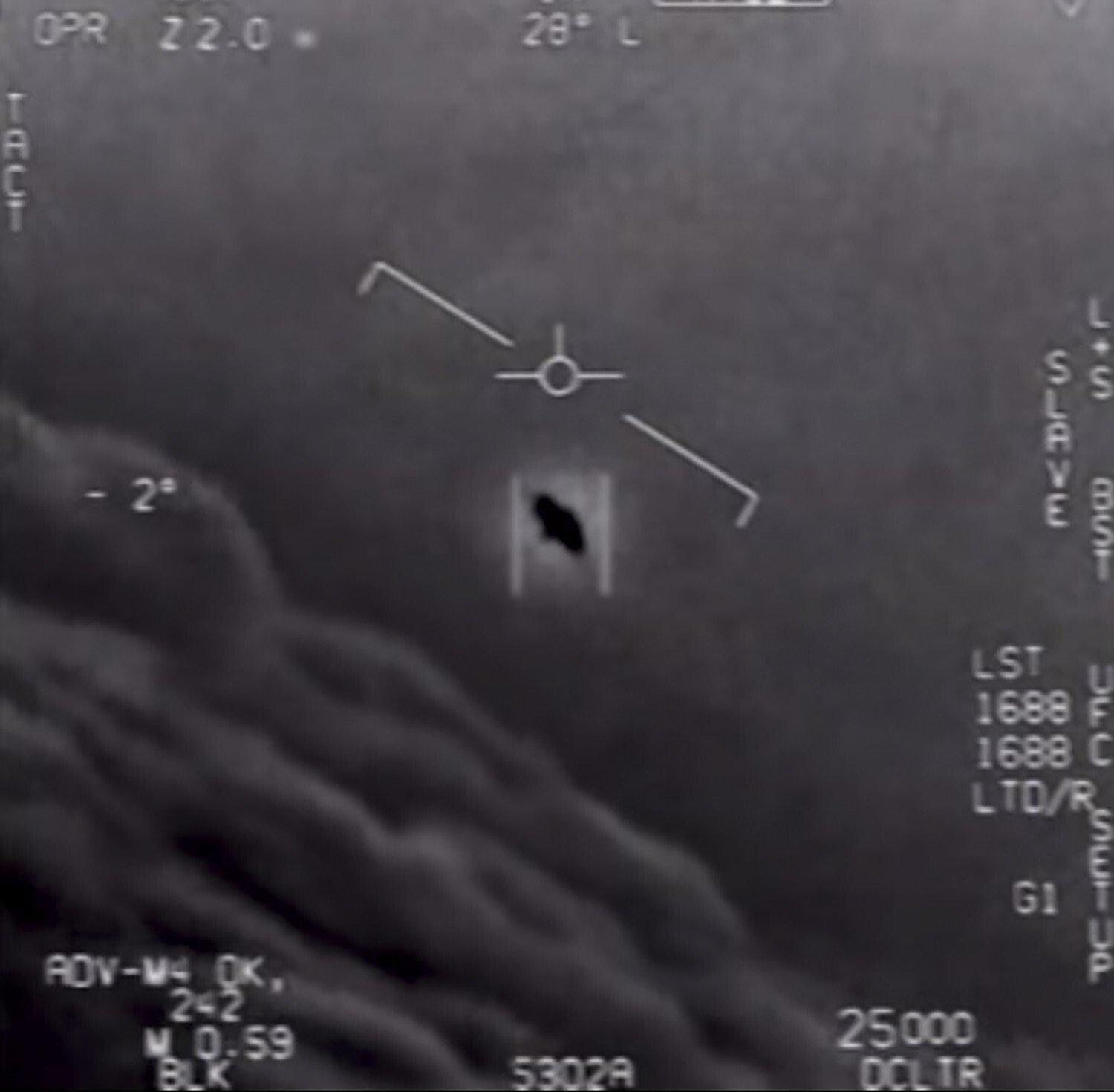 A screen grab from an unclassified video taken by US Navy pilots shows an interactions with an “unidentified aerial phenomena”. Image: US Department of Defence via AFP