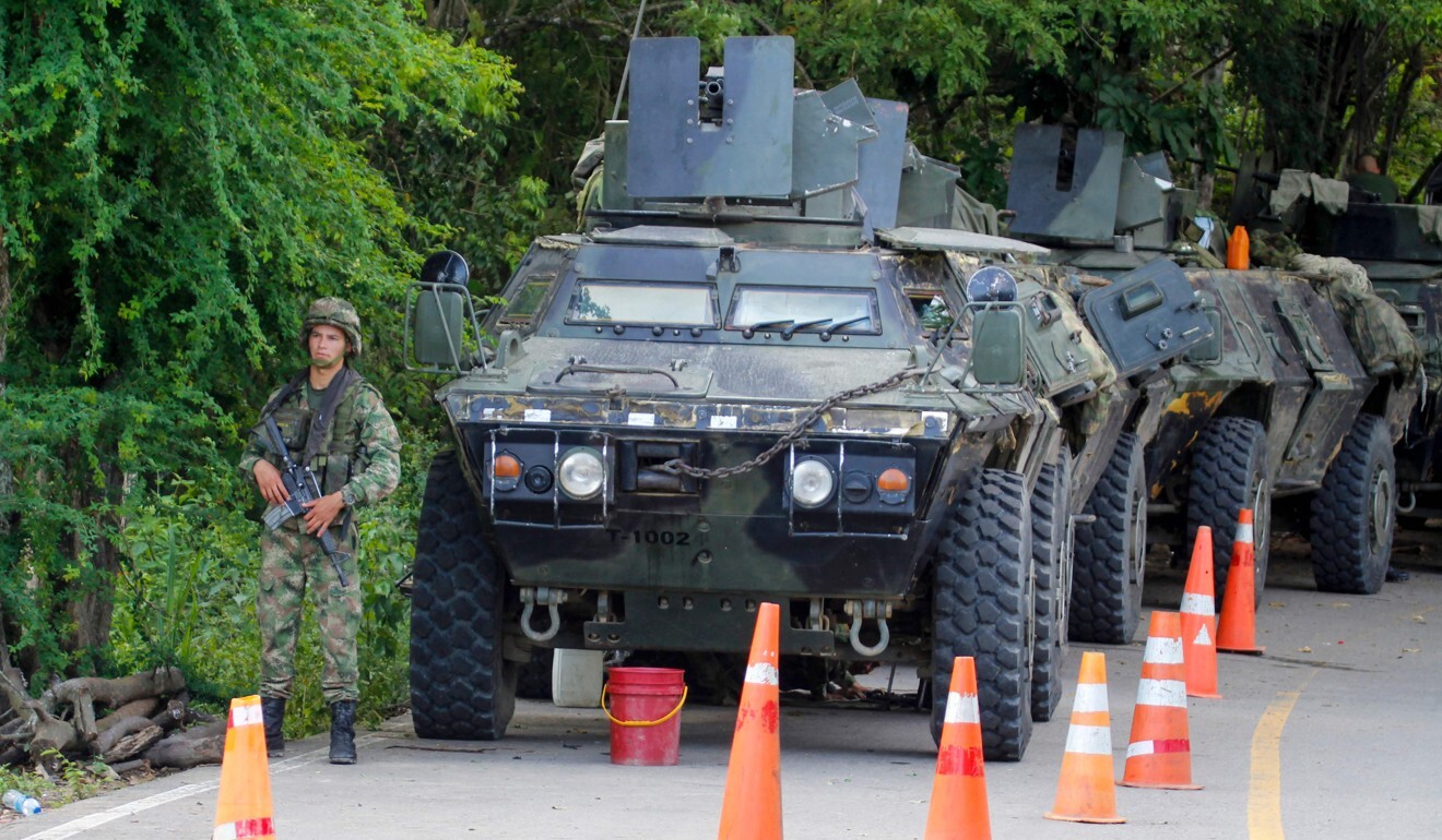 Colombian armoured vehicles, deployed on the streets. Photo: AFP