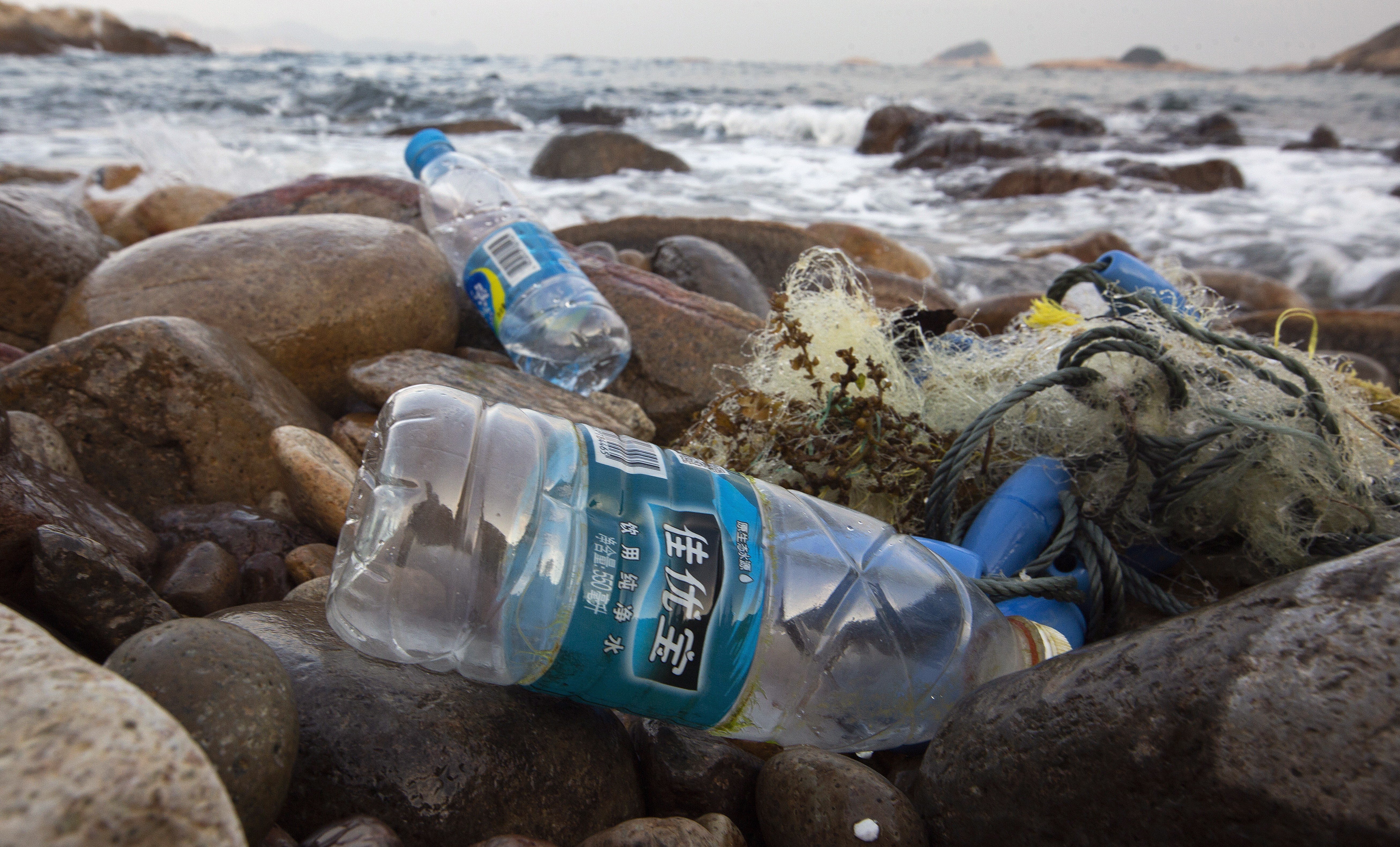 Discarded plastic water bottles are washed up on a beach in Lung Ha Wan, Clear Water Bay, Hong Kong, in December 2018. Photo: EPA-EFE