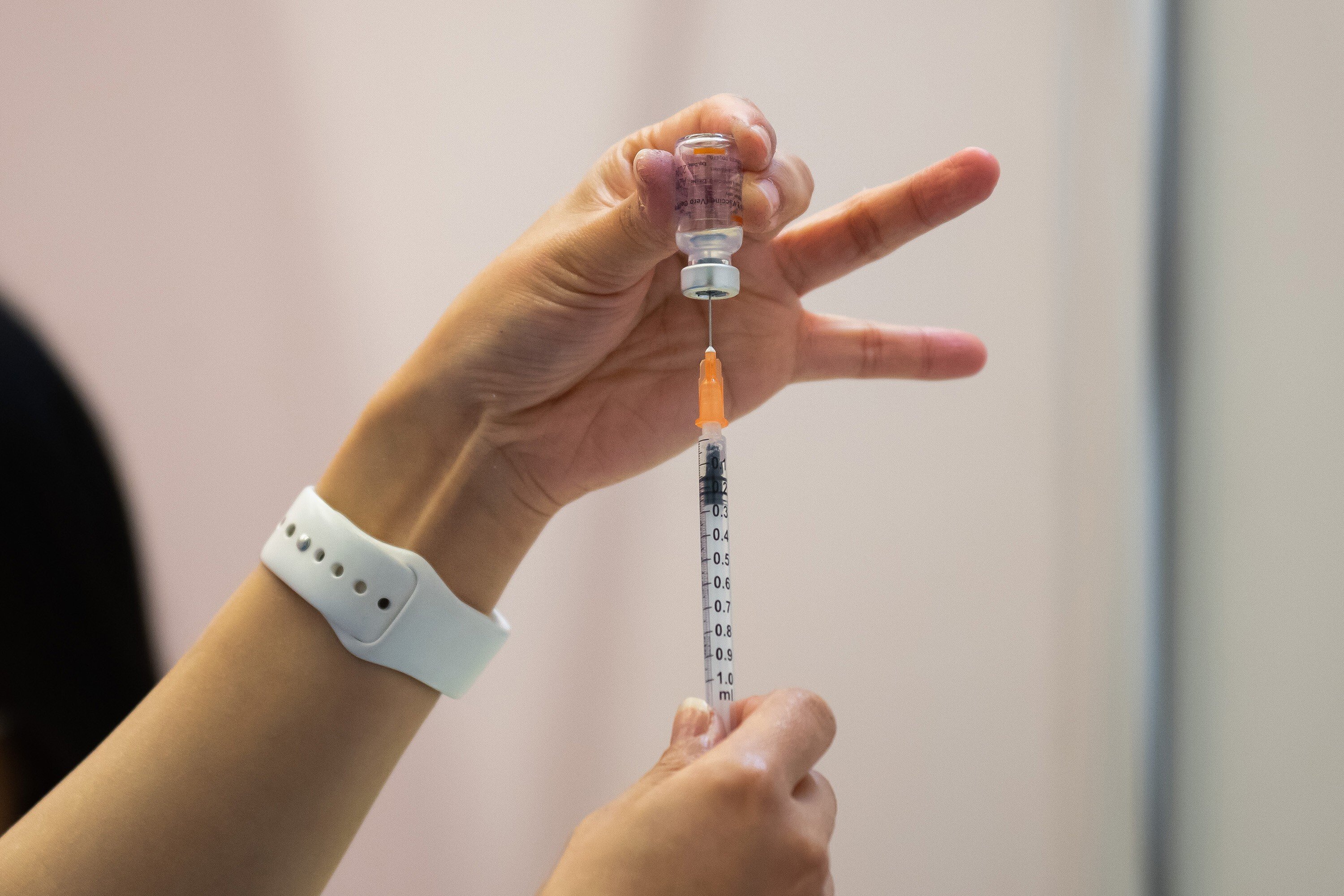 A nurse fills a syringe with a dose of Covid-19 vaccine at a community vaccination centre in Hong Kong. Photo: Billy H.C. Kwok/Getty Images/TNS