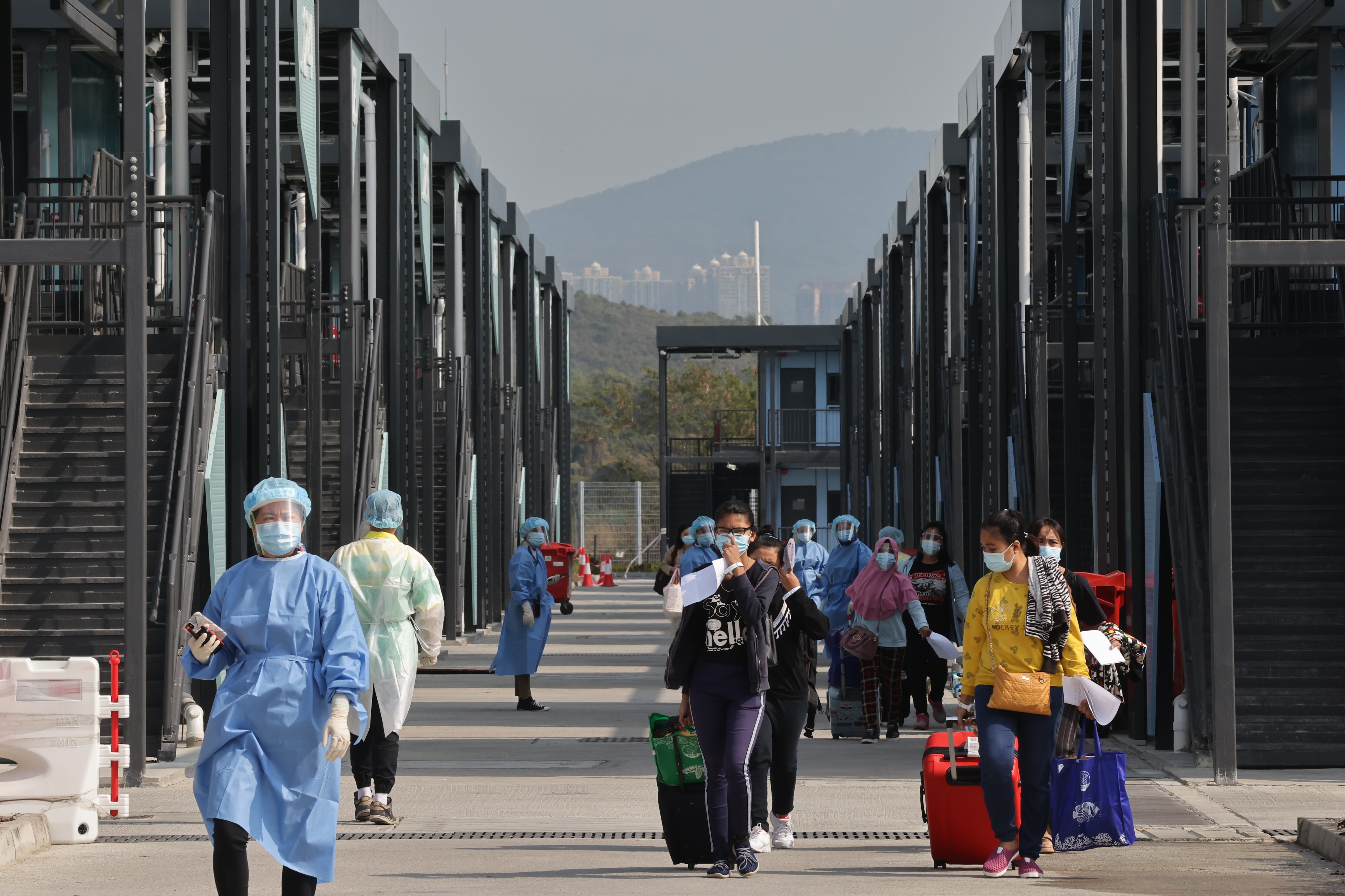 People arrive at the Penny’s Bay quarantine centre on Lantau Island on March 19. Photo: Dickson Lee
