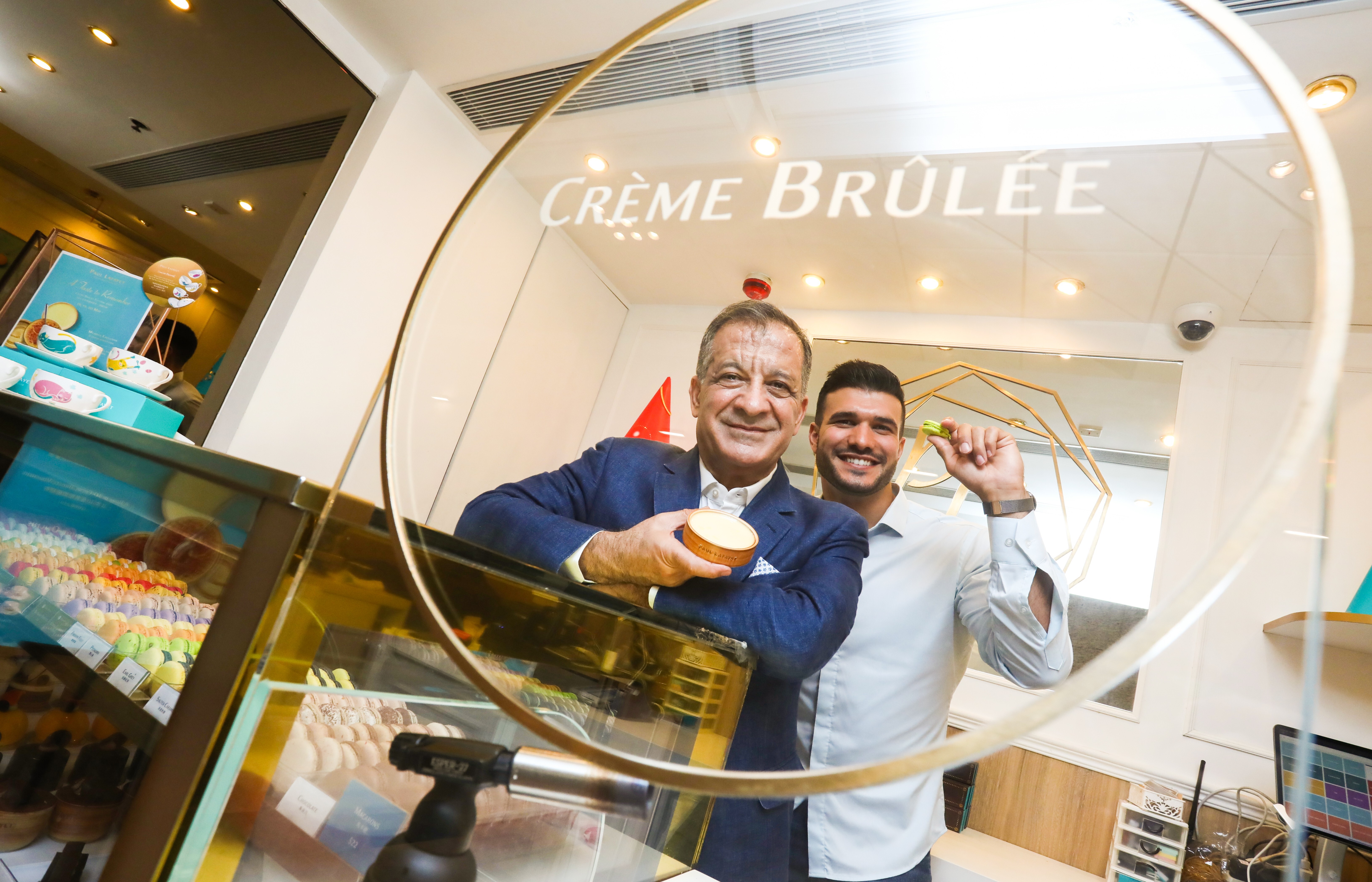 Paul Lafayet founder Toni Younes with his son Christophe, the co-founder of the patisserie, at their shop in K11 Art Mall, in Tsim Sha Tsui, Hong Kong. Photo: Jonathan Wong