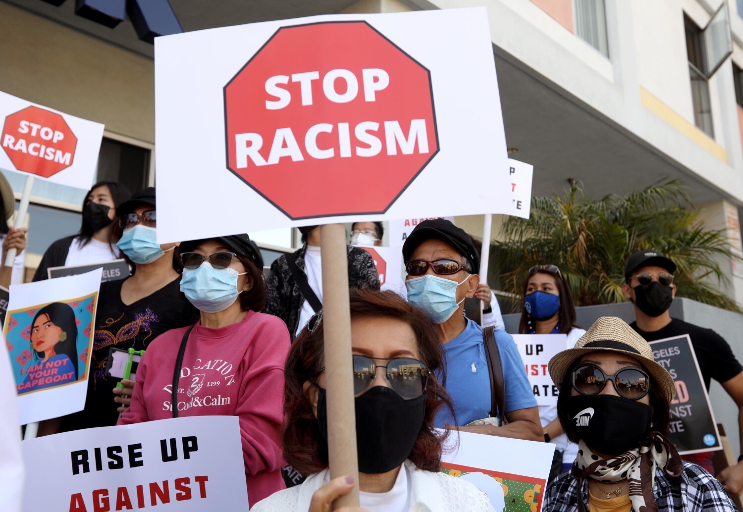 Members of the Thai-American community, along with political leaders and members of law enforcement, participate in a rally against anti-Asian hate crimes in Los Angeles on April 8. Photo: Los Angeles Times via TNS