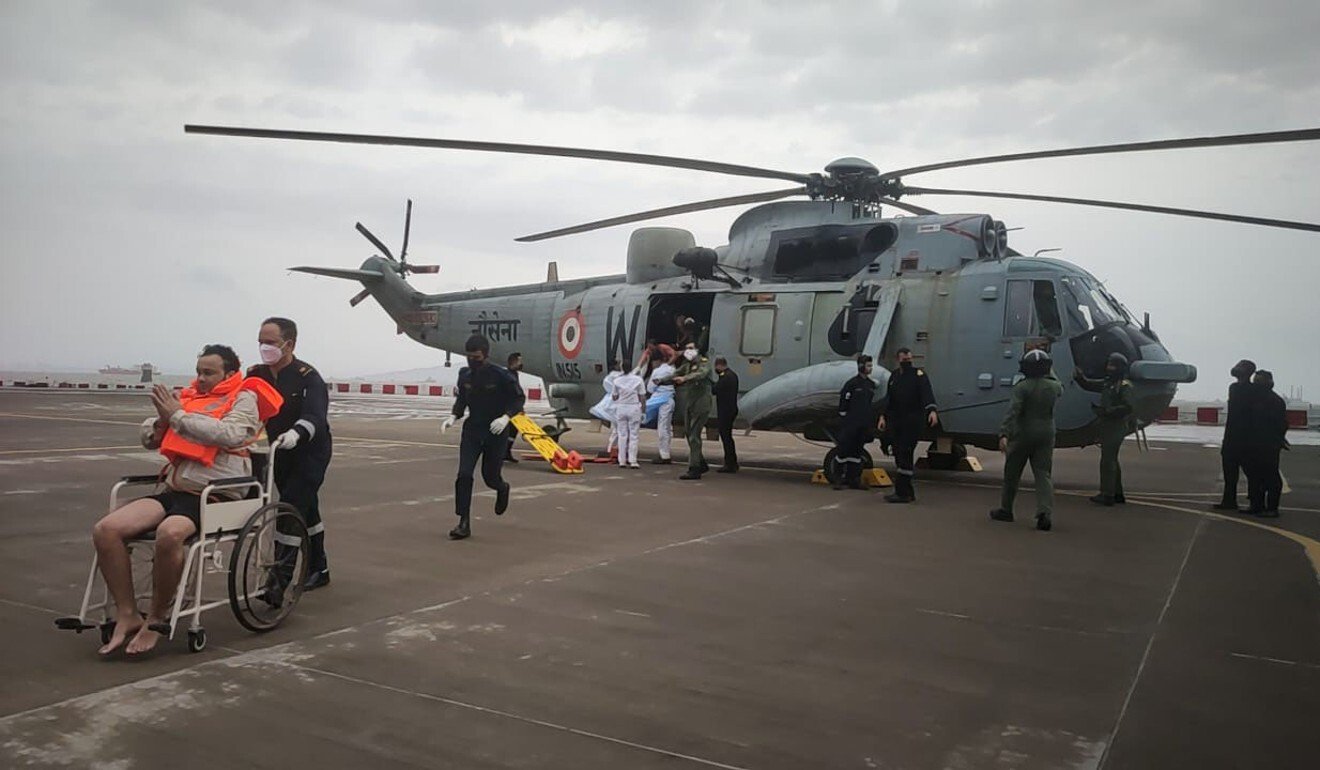 One of the men rescued by the navy from the Arabian Sea being brought for medical attention at a naval air station in Mumbai. Photo: Indian Navy via AP