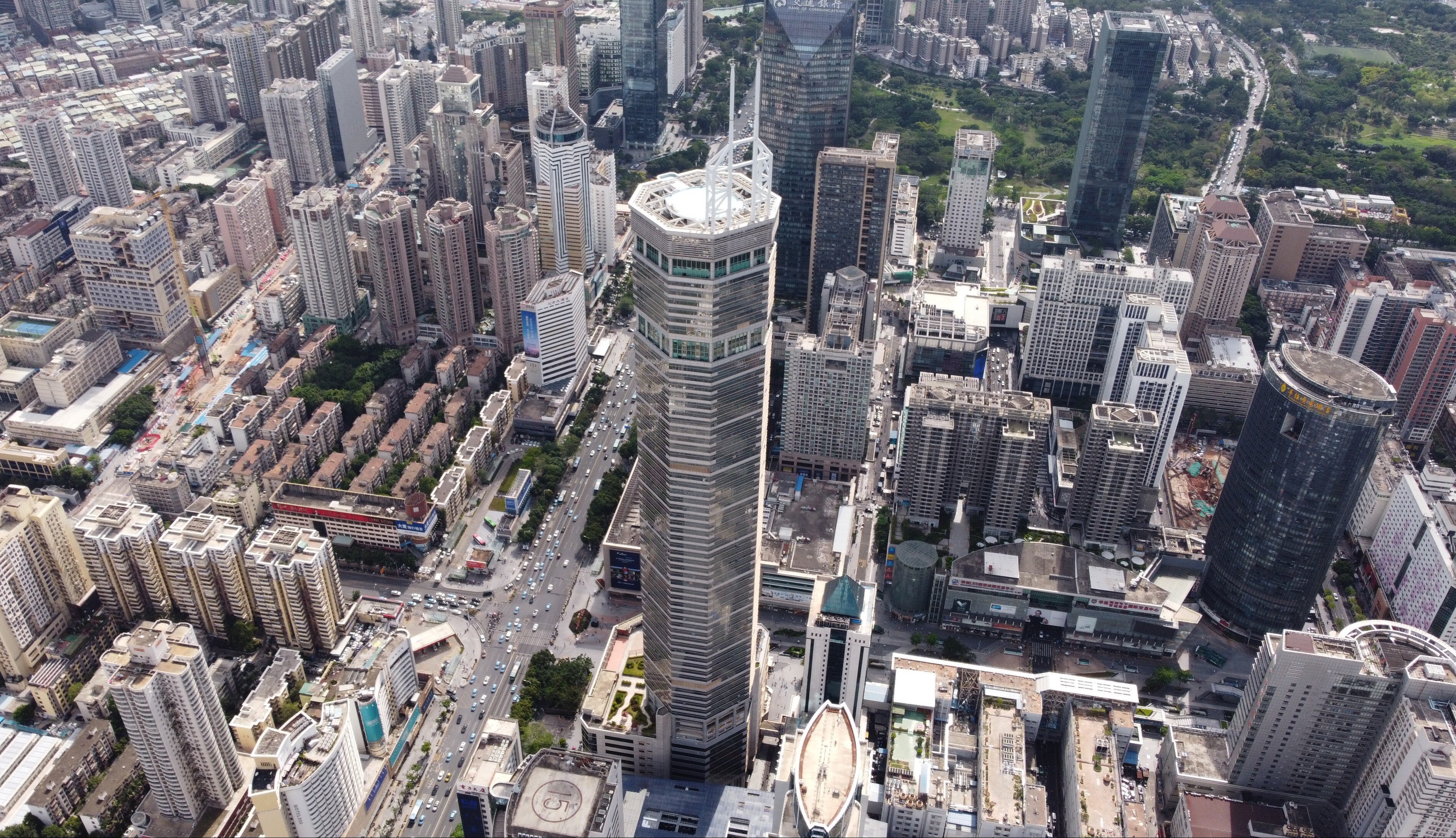 BIG's prisma towers subtly shimmer in the skyline of shenzhen