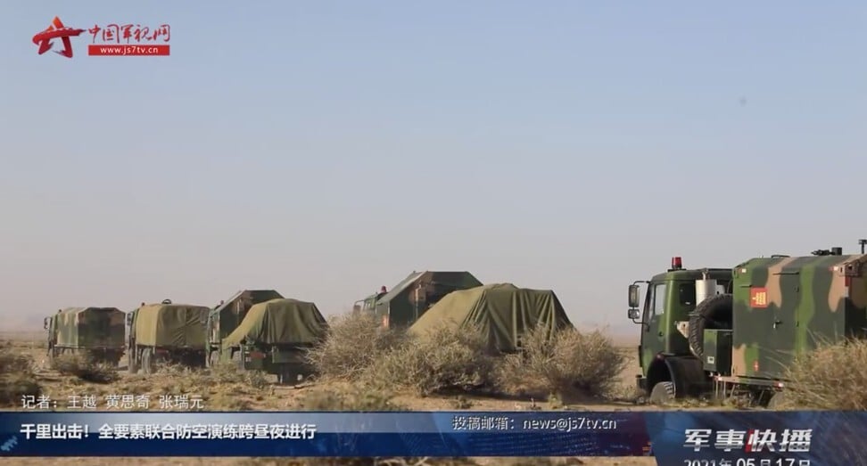 A ground-to-air missile brigade of the PLA Air Force spent three days and nights travelling to unfamiliar terrain to test the upgraded HQ-9B air defence missile systems. Photo: CCTV