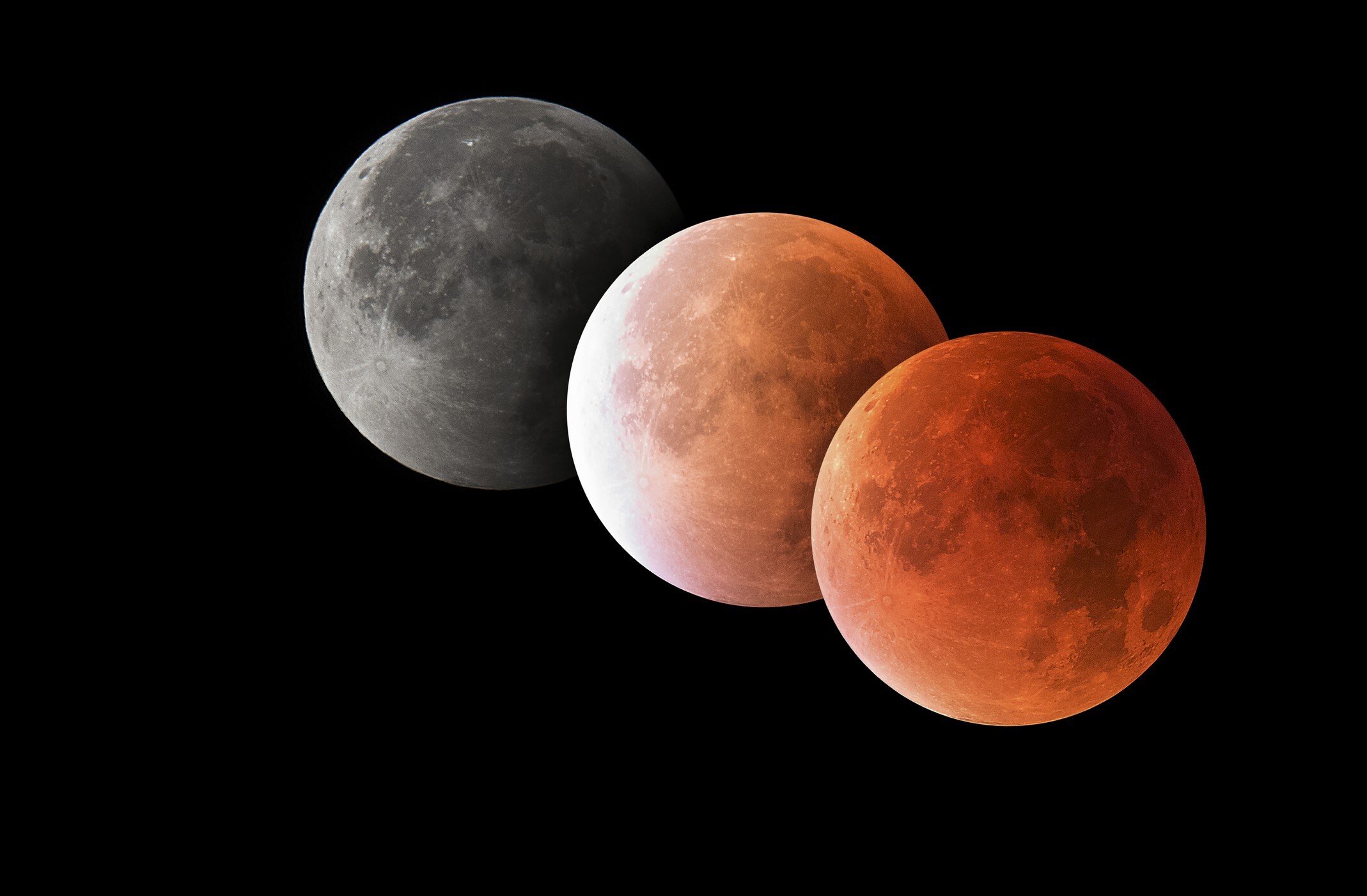 A super blood moon turns orangey-red (above, right). The colour fades as a partial eclipse ensues (above, centre), followed by a penumbral eclipse, when the moon appears a dulled grey (above. left). Photo: Getty Images/Westend61